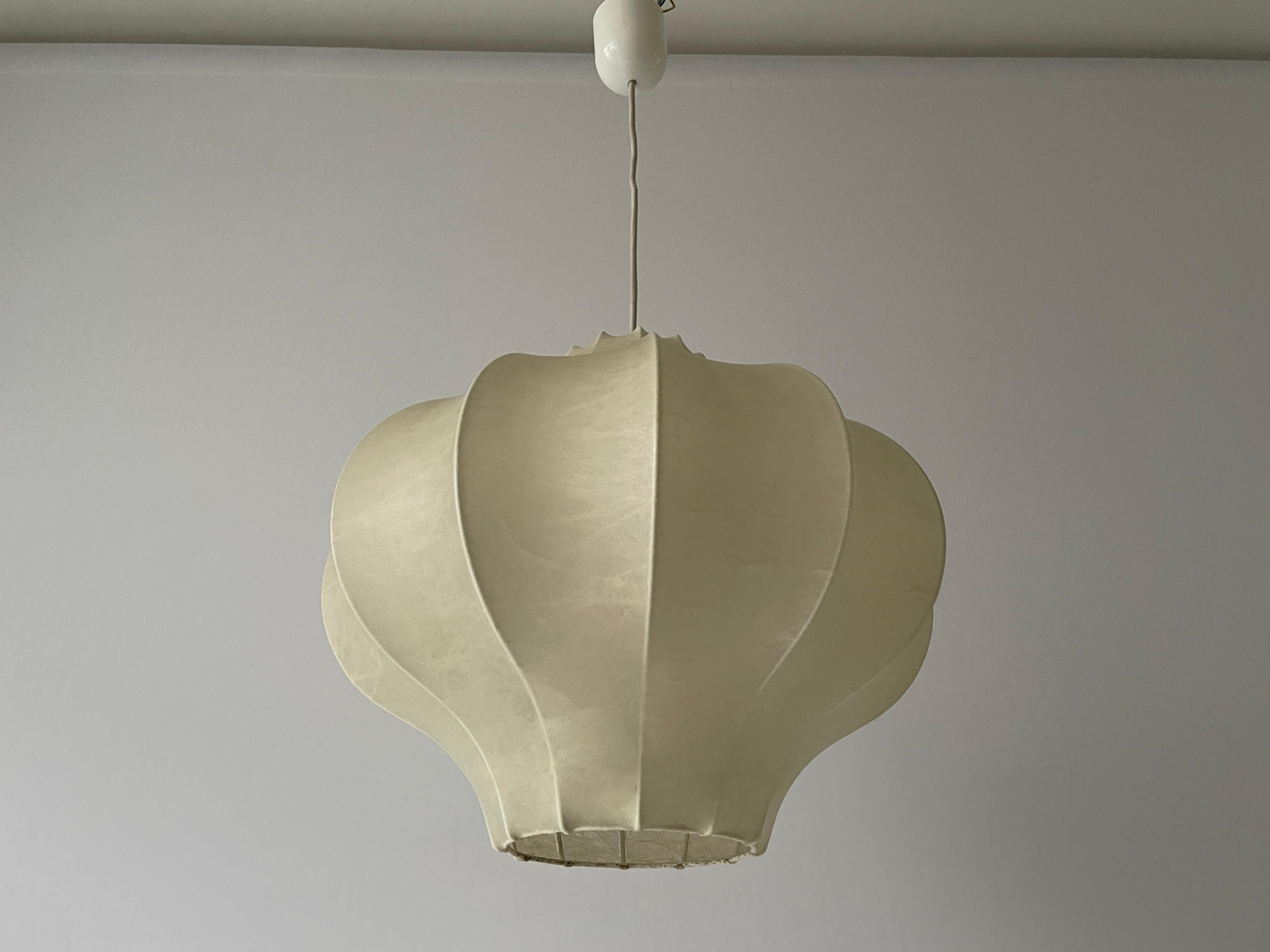 Cocoon Pendant Lamp by Goldkant, 1960s, Germany

Lampshade is in very good vintage condition.

This lamp works with E27 light bulbs. 
Wired and suitable to use with 220V and 110V for all countries.

Measurements:
Height: 75 cm
Shade diameter and