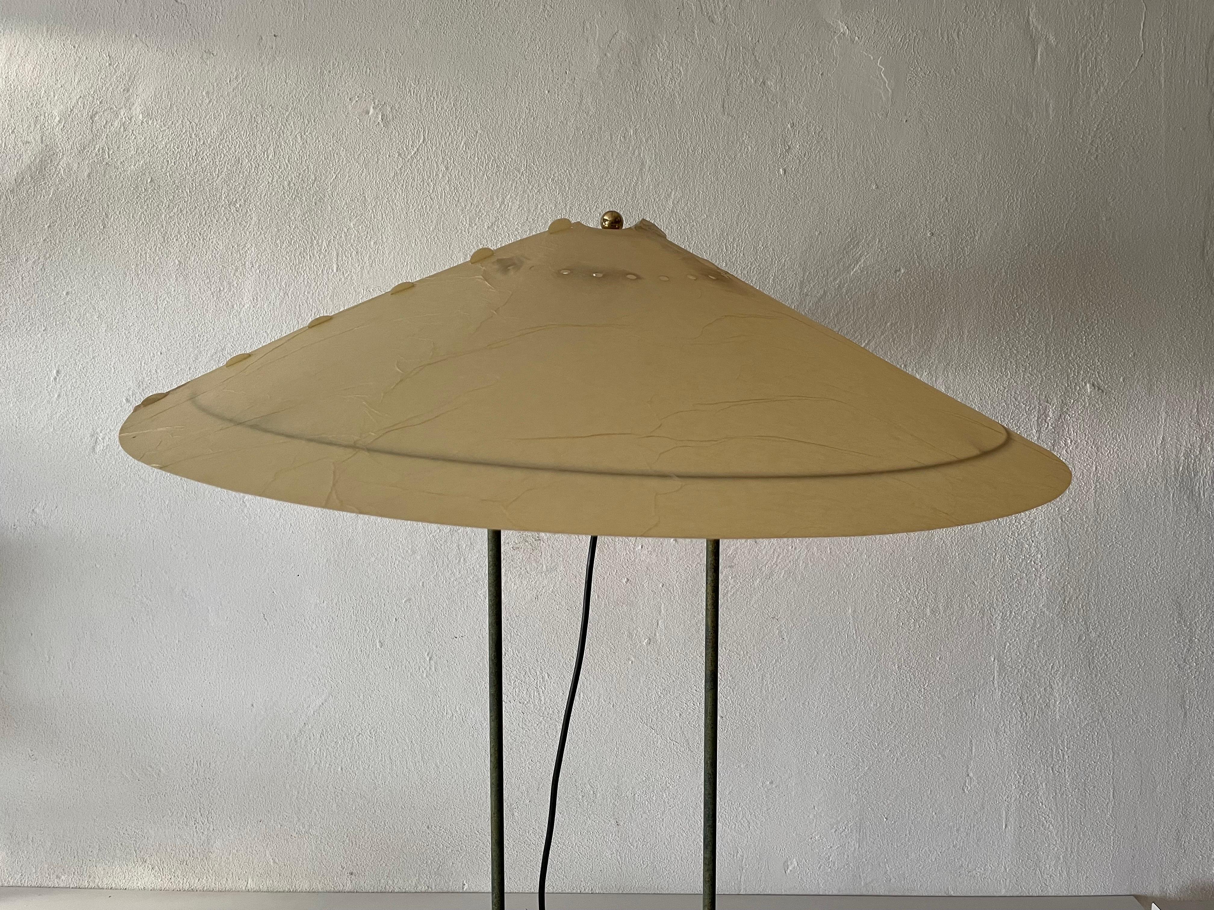 Exclusive cocoon plastic paper and green metal body industrial table lamp, 1950s Germany
 
Cocoon shades & metal body

There are some small rips on the lamp shade. You can see it in the photos

Minimal and natural design
Very high