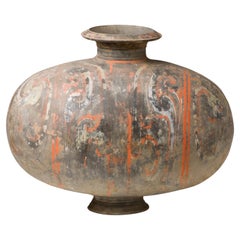 Cocoon-shaped jar with cloud-scroll design, Han Dynasty