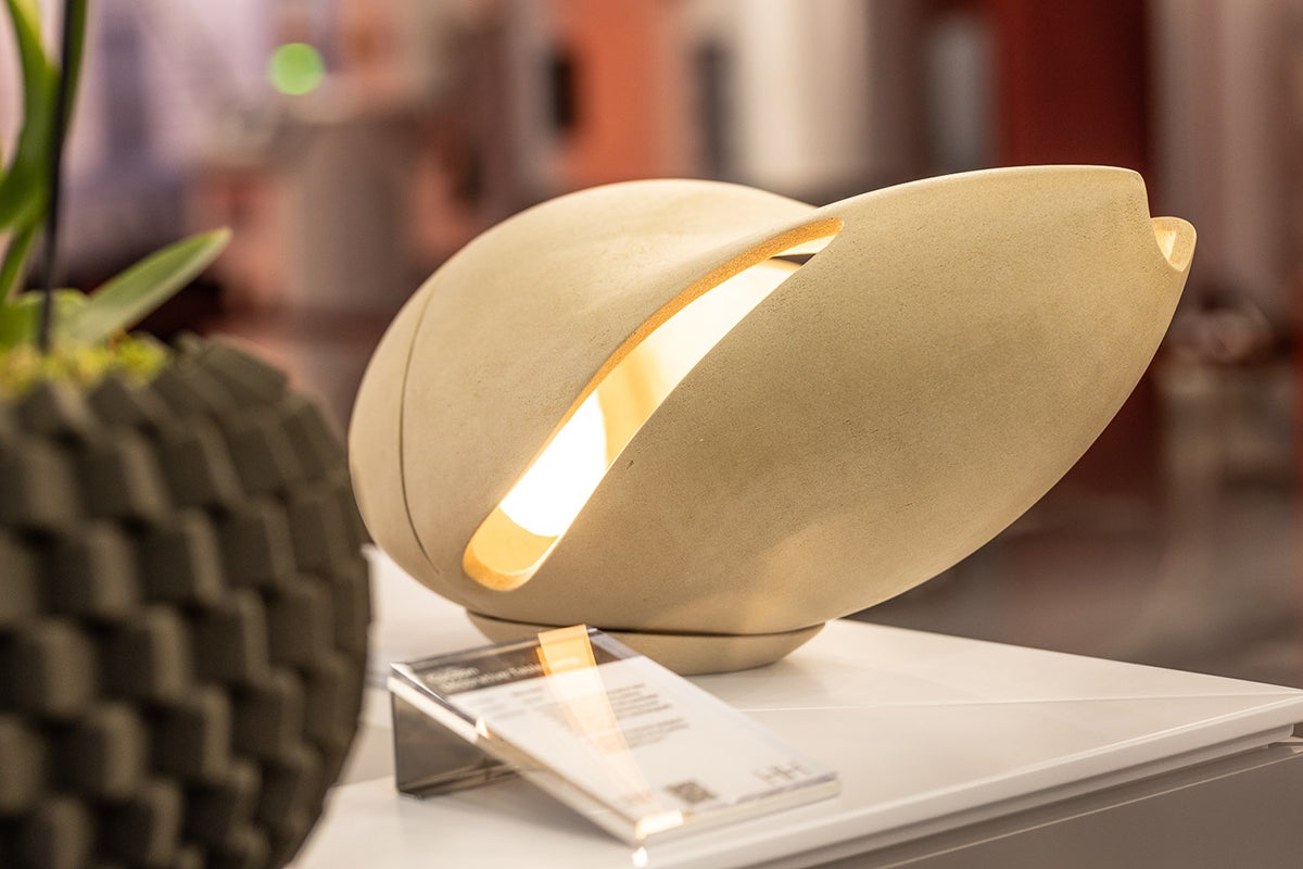 Cocoon is a 3D printed decorative lamp celebrating craft and pushing the boundaries of new and
sustainable technologies by transforming wood waste into an organic, technologically advanced
light. 

The sculptural form of Cocoon has been developed to
