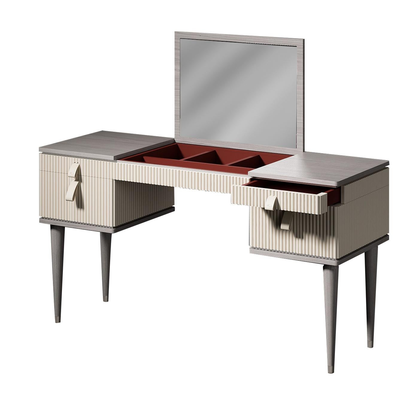 Functional yet chic, this striking vanity table is the perfect bedroom accessory for the modern woman. Made entirely of wood, the tapered legs, base, and top have a modern grey finish, while the drawer units of beige lacquered wood boast a