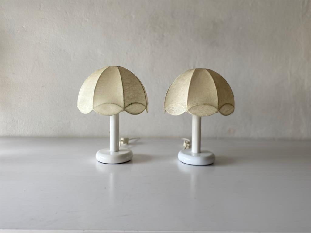 Cocoon & White Metal Body Pair of Table Lamps by GOLDKANT, 1970s, Germany
 
Cocoon shades & metal body

Minimal and natural design
Very high quality.
Fully functional.
Original cable and plug. These lamps are suitable for EU plug socket. 

Lamps are