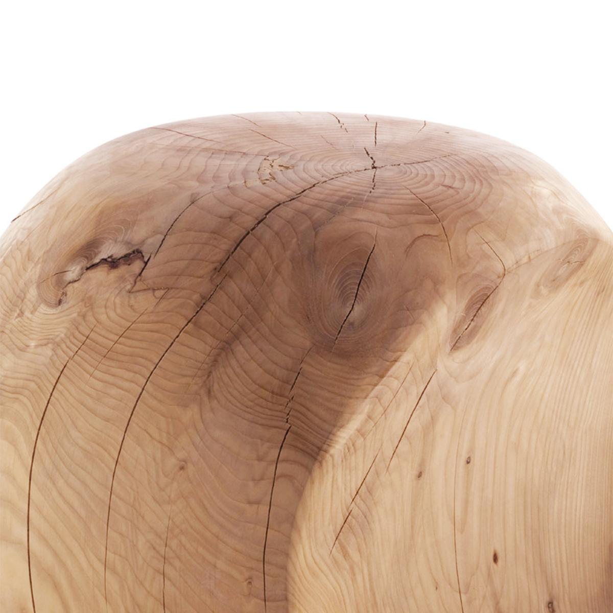 Stool Cocoona shape 2 in solid natural aromatic
cedar wood. Made in one block of cedar wood.
Treated with natural pine extracts.
Can be used in the 3 faces of the stool.
Solid cedar wood include movement, 
cracks and changes in wood conditions,