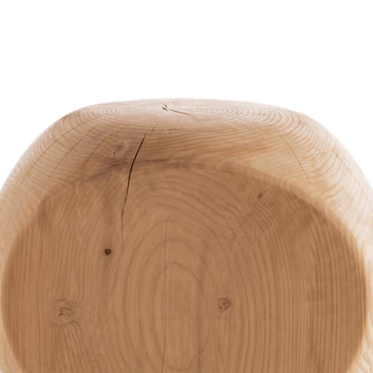 Stool cocoona shape 3 in solid natural aromatic
cedar wood. Made in one block of cedar wood.
Treated with natural pine extracts.
Can be used in the 3 faces of the stool.
Solid cedar wood include movement, 
cracks and changes in wood conditions,