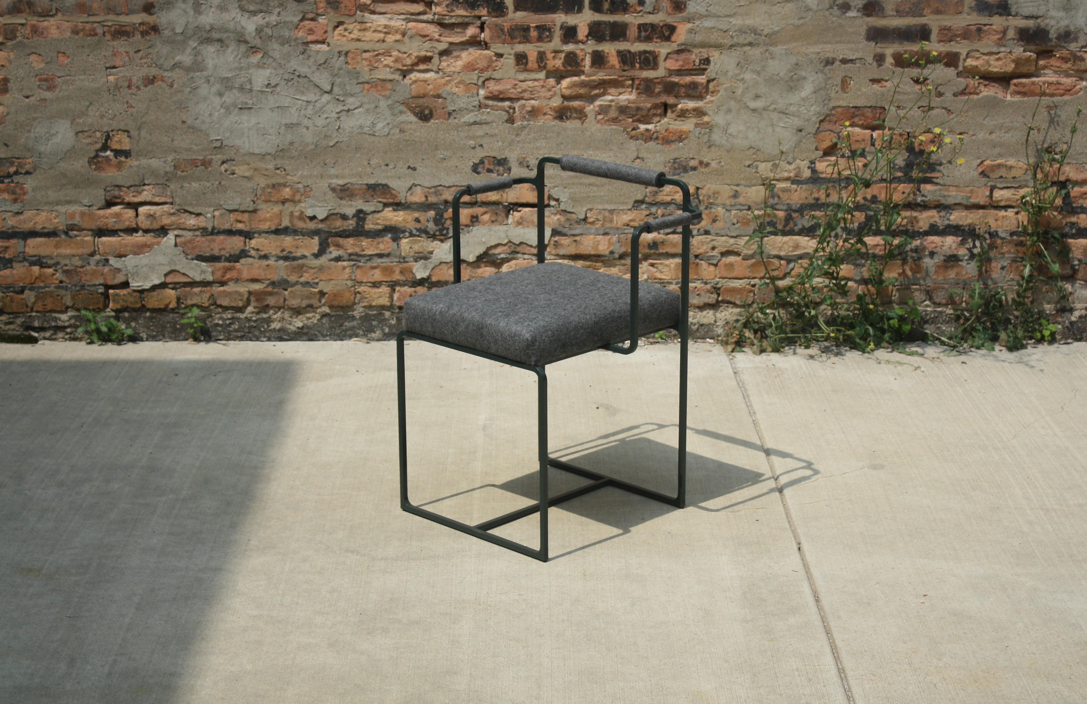 Shown with a glossy essex green frame and merino wool felt upholstery (graphite)
Also shown without arms with a blackened steel frame and merino wool felt upholstery (graphite/rost) and rendered with a hardwood seat and as a 48