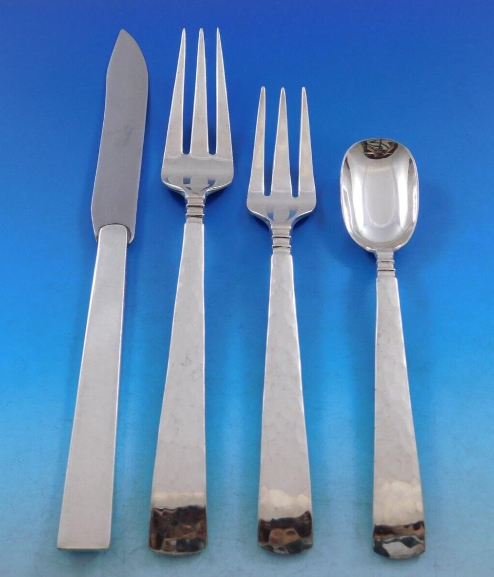 Codan Mexican sterling silver dinner flatware set with subtle hand hammered finish, 51 pieces total (including 10 dinner knives by Allan Adler). This set includes:

10 Dinner size knives, solid handles with stainless blades, 9 3/8