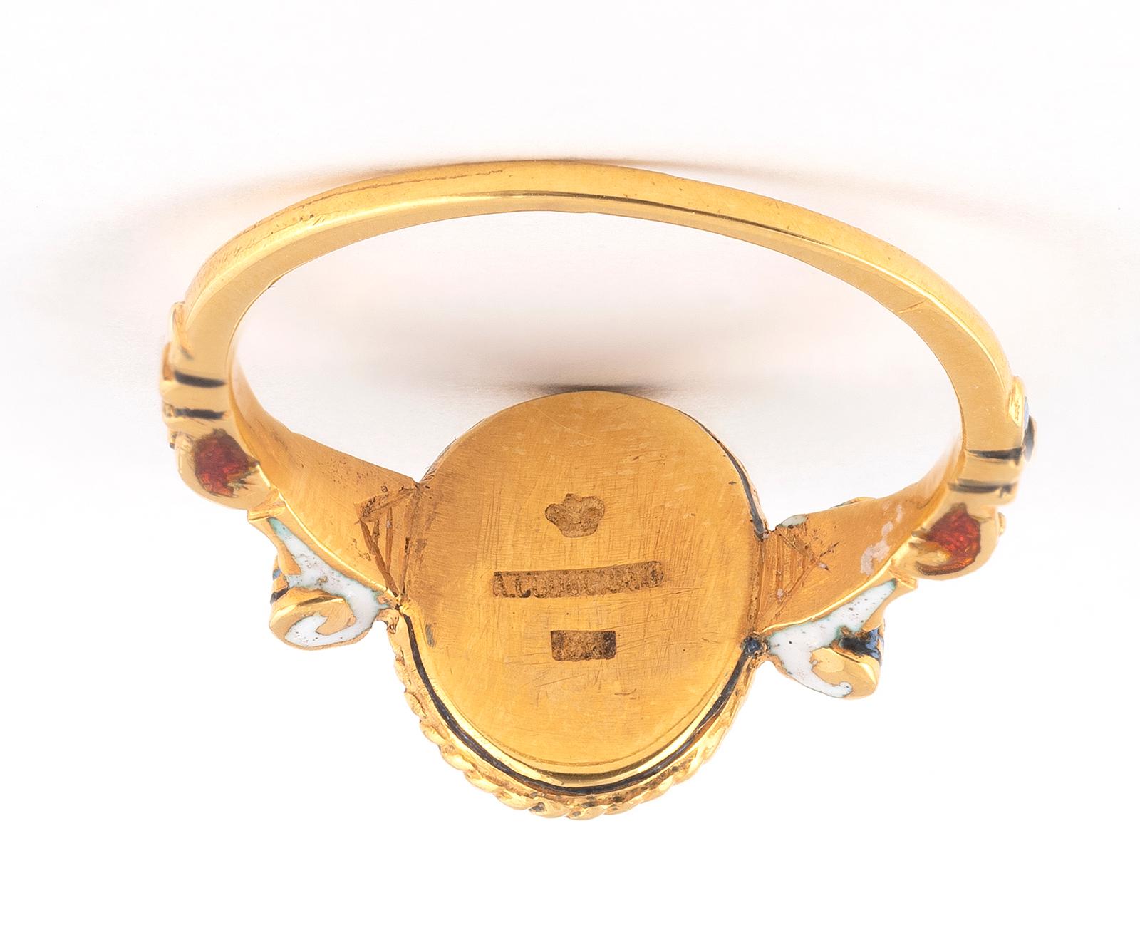 Renaissance style Memento Mori skull ring made with champleve multicolored enamels. With diamond eyes.
Mounted in 18Kt gold
Signed A. Codognato Venezia
Weight: 7,32 gr
Finger size: 9