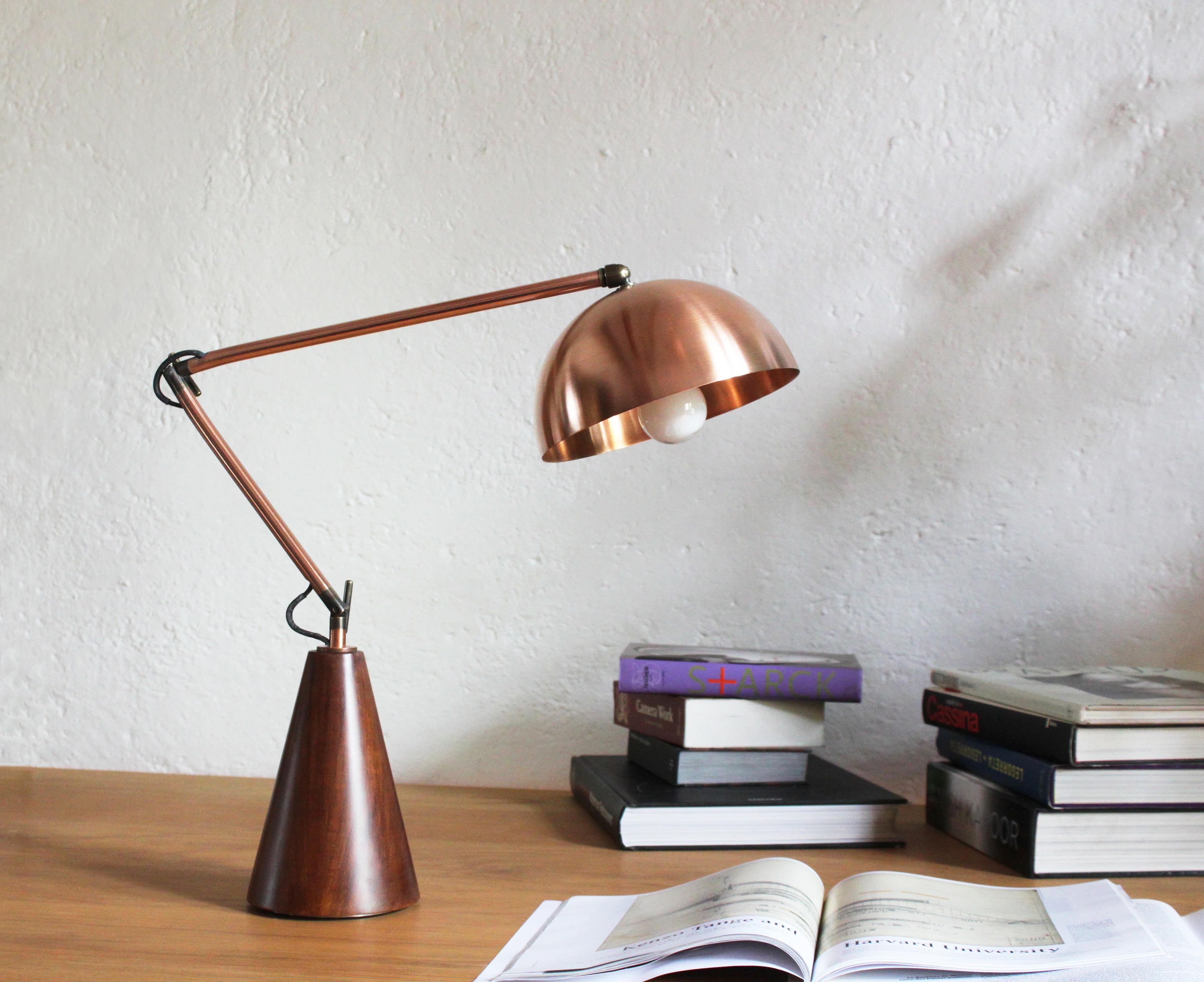Codos De Mesa lamp is made of satin copper, solid steel, and Tzalam wood.

Full dimensions:
H 51cm x W 48cm
Volcano base: 20 x 60 x 50 cm
Dome: ø 20 x H 10 cm

Please contact the gallery, Tuleste Factory, for customizable options. The lead time for