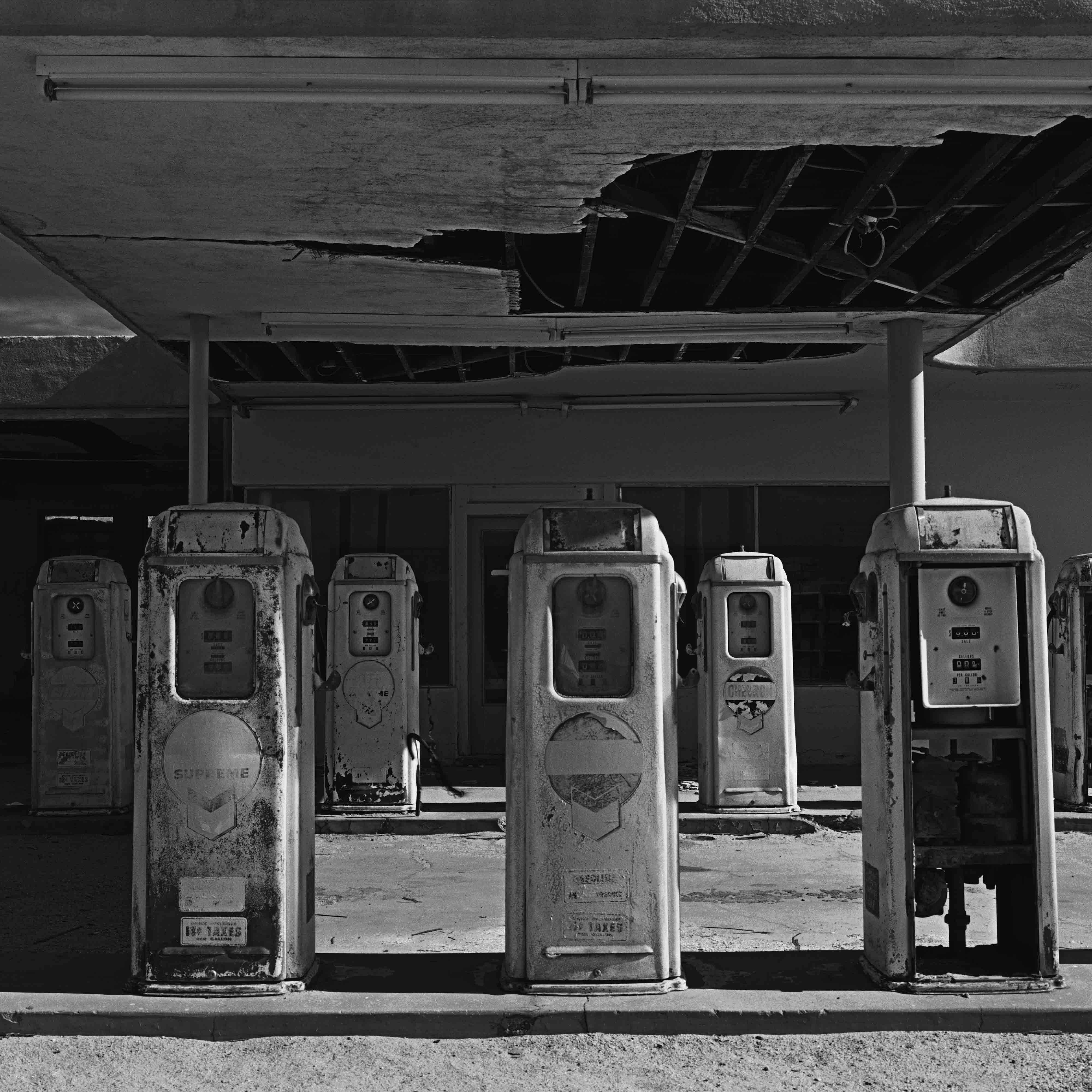 Cody S. Brothers Black and White Photograph - Landscape Photography Square Series: 'Gas Pumps'