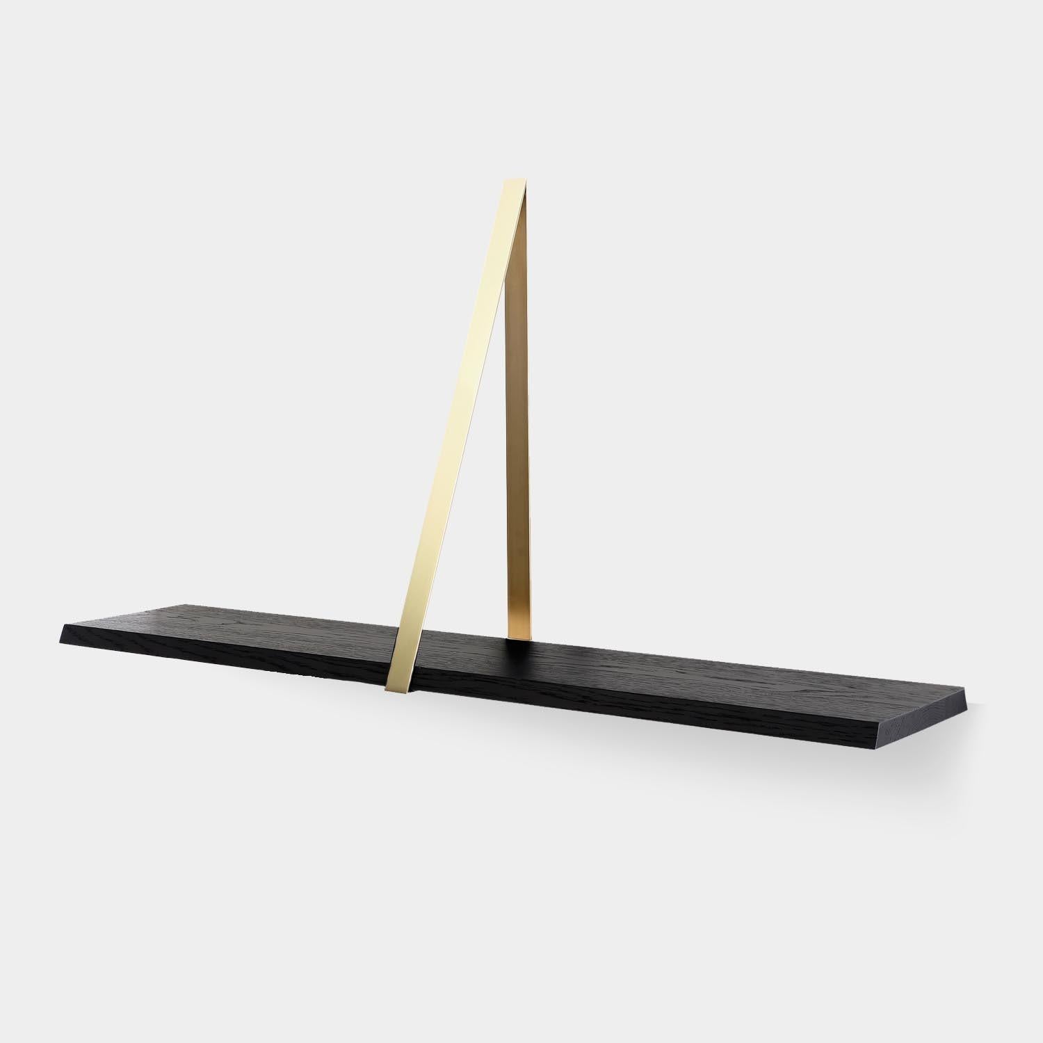 Wall shelf top in natural solid or black varnish oak. Brass frame.
Dimensions: 100X20xH50cm