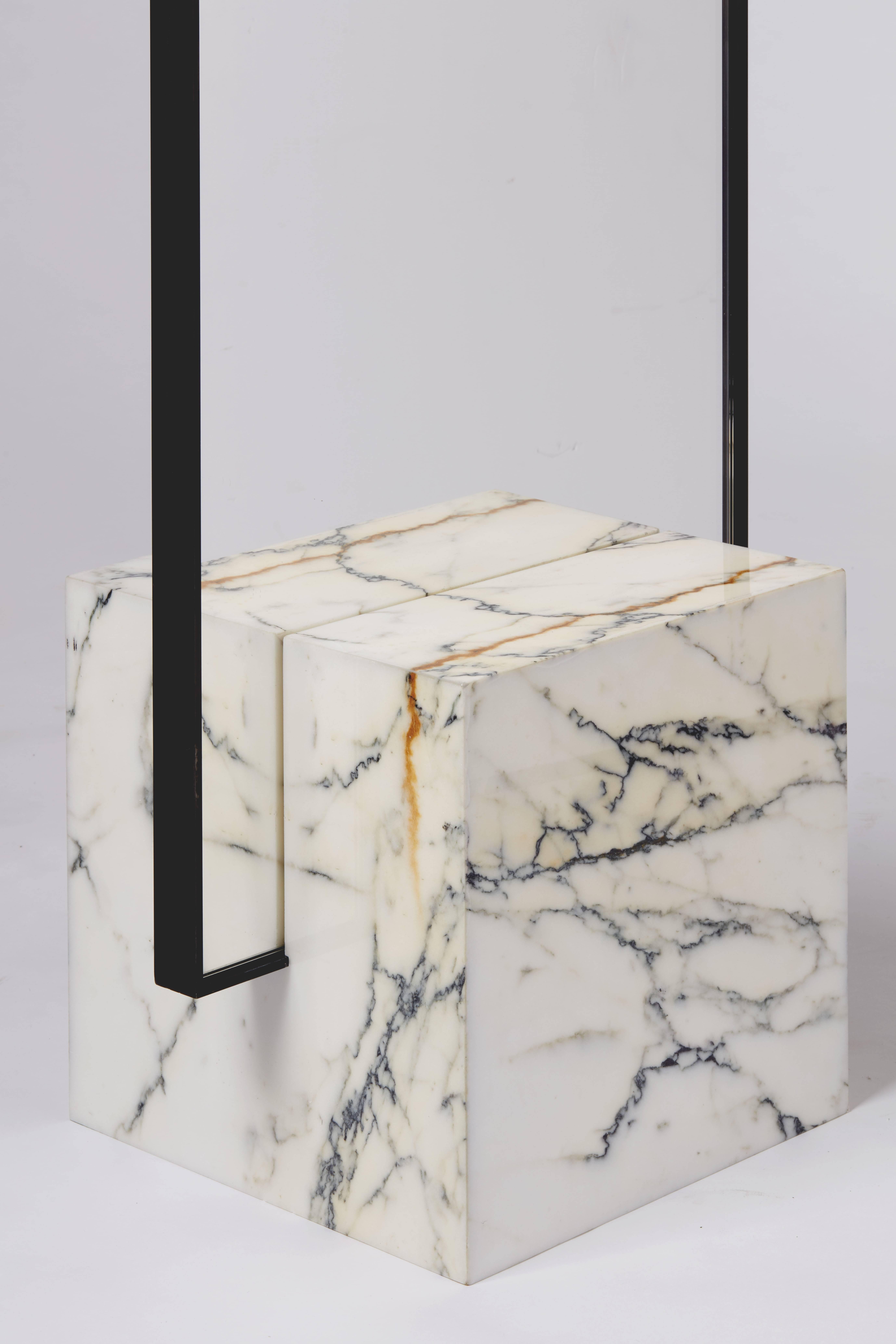 Coexist slash standing mirror with polished marble cube, concrete rubber and black steel mirror frame.

NYC Design 2018 Awards Winner.