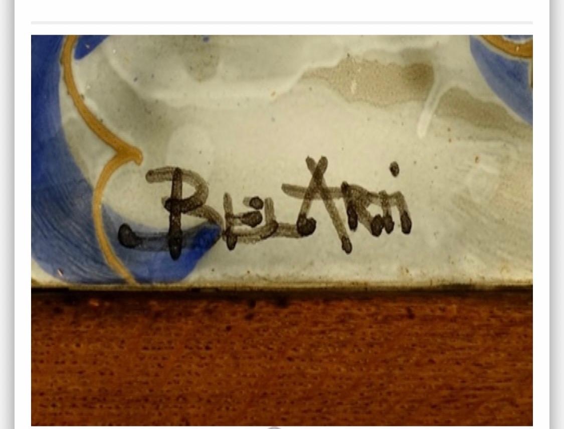 un café en acajou et carreaux signé Belarti.