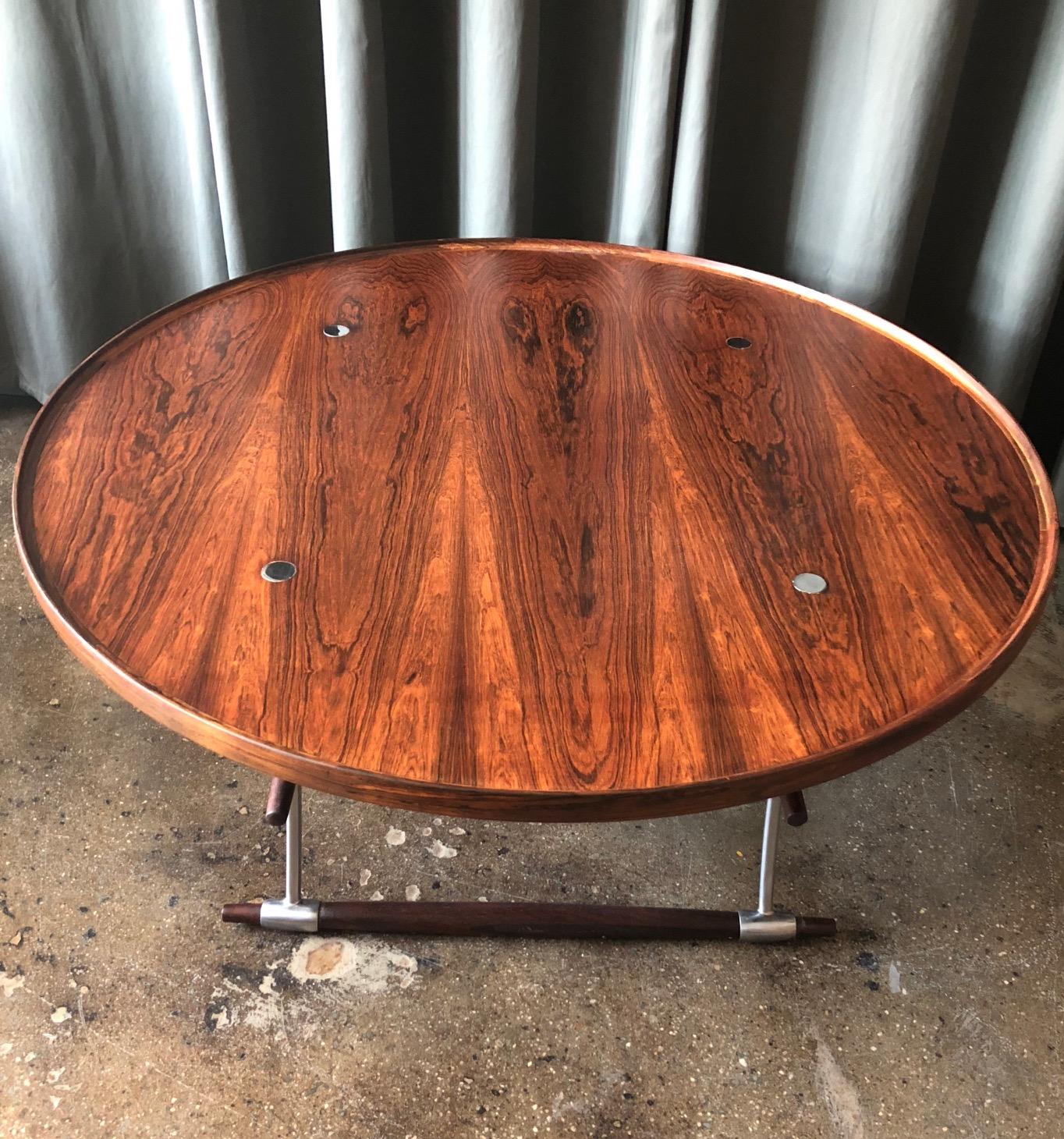 Stokke coffee table designed by Jens Quistgaard for Nissen, Denmark, circa 1960. Rosewood and polished metal. Excellent vintage condition.
 