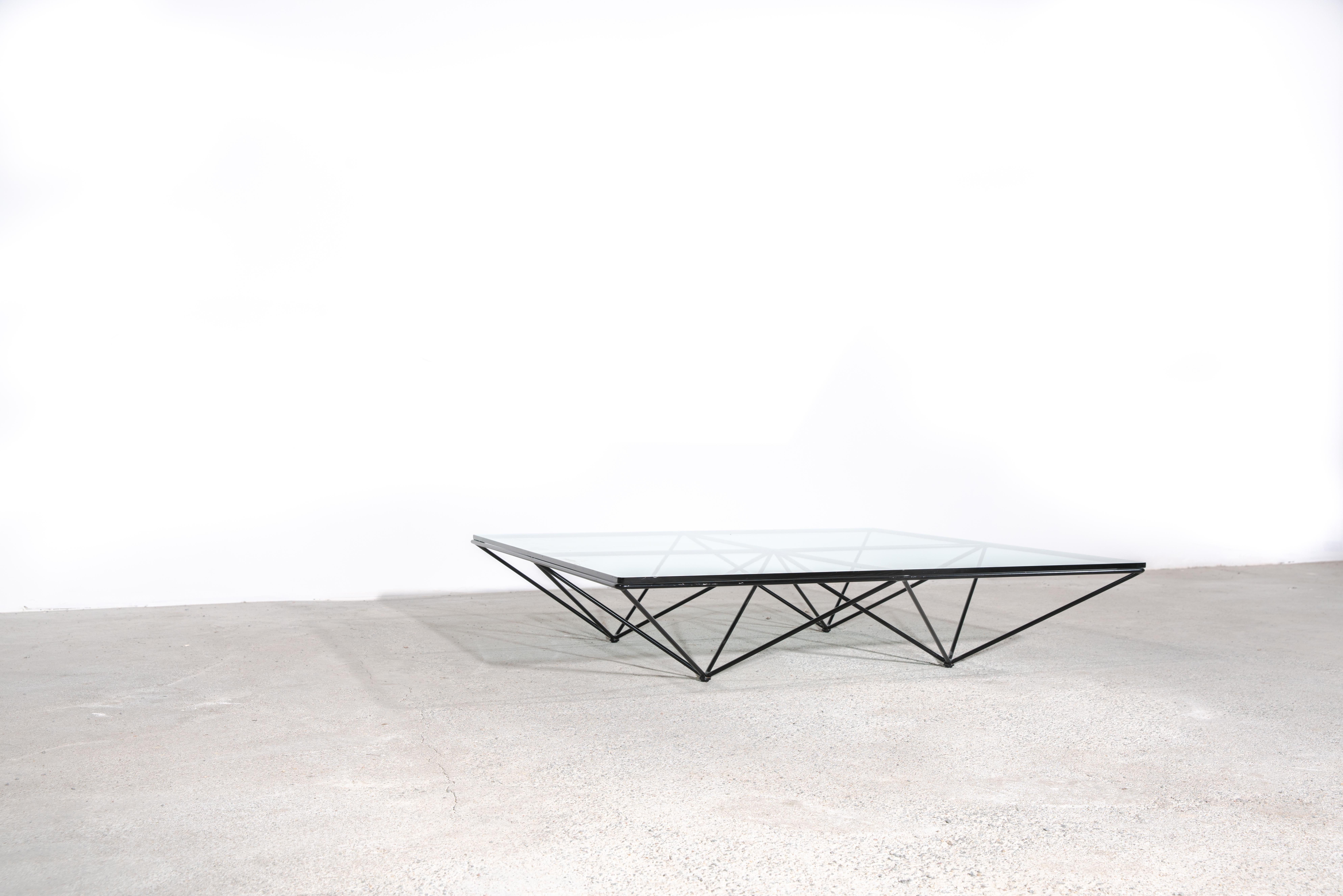 Alanda by Paolo Piva is a coffee table produced by C&B, today B&B Italia, in 1981. Its design follows a precise architectural construction and is endowed with a characteristic formal composition obtained through the assembly of pyramidal