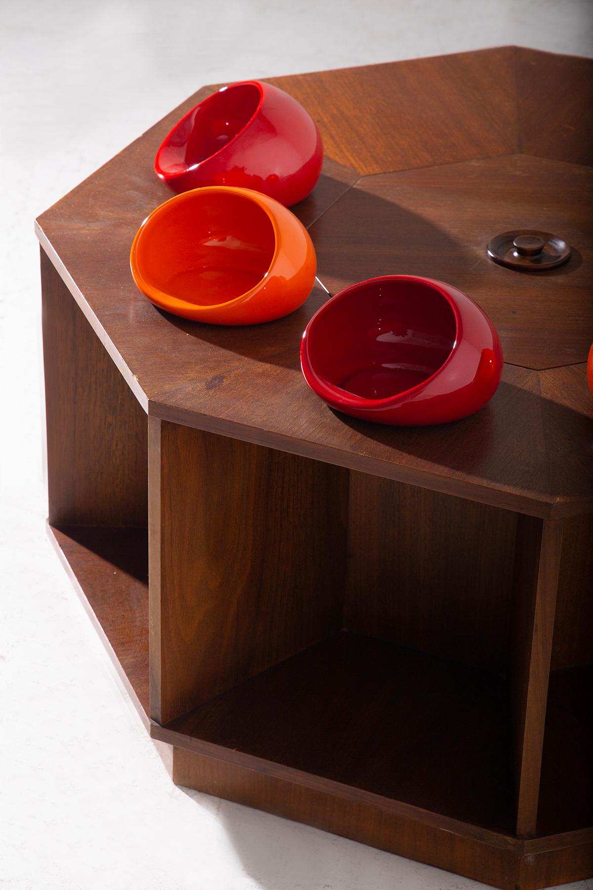 Immerse yourself in the artistry and innovative design of the mid-20th century with this exquisite coffee bar table attributed to Italian architect Vittorio Gregotti. Perfectly blending functionality with stylish flair, this piece stands out with