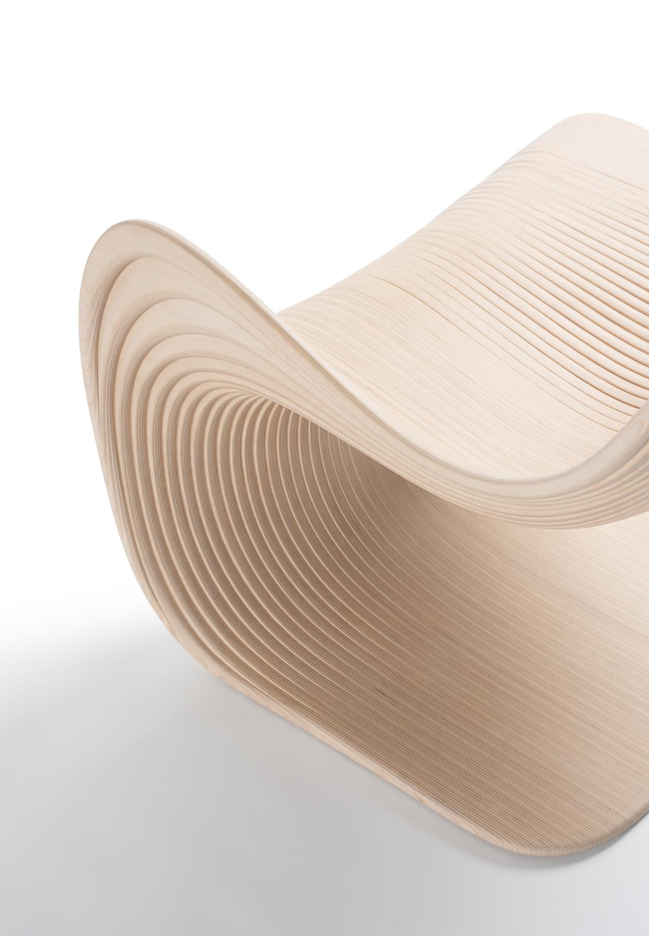 The Coffee Chair is a masterful blend of technology and craftsmanship, resulting in a sophisticated, ergonomic, and minimalist design. This exquisite piece is perfect for any environment, offering both a unique aesthetic and exceptional