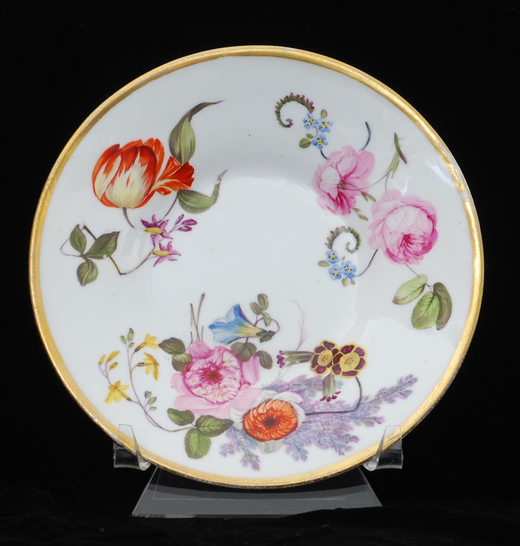 A rare coffee cup and saucer in Nantgarw’s superb soft-paste porcelain. Each piece is gilded and decorated in one of the London workshops with superb flower painting, probably by Moses Webster.

The Nantgarw factory lasted only a few years, but