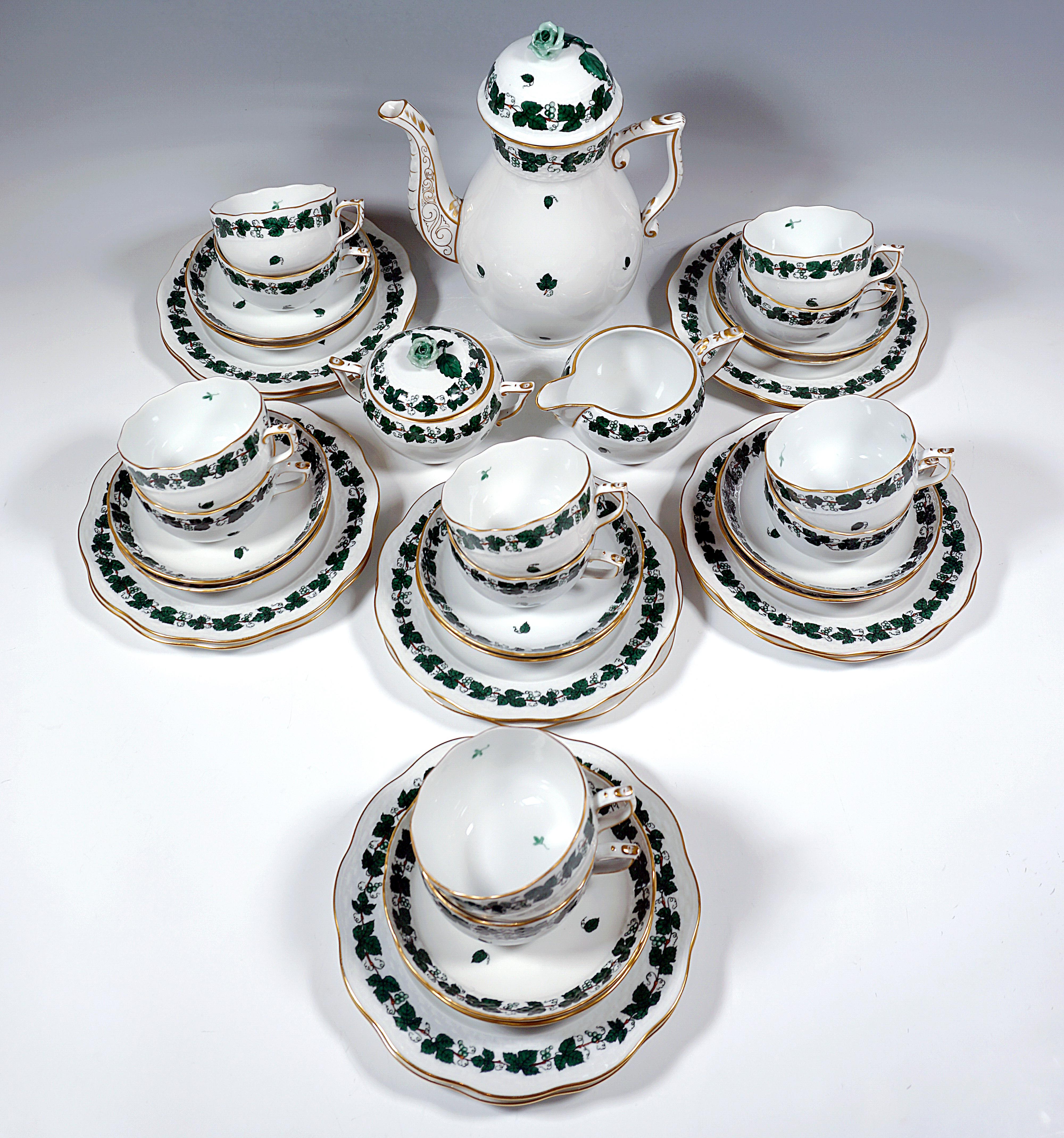 Herend service consisting of 39 parts: coffee pot with lid, milk jug, sugar bowl, twelve cups, twelve saucers and twelve dessert plates.
Decor: VSZG-3 - vine leaf tendrils with gold decoration.

Manufactory: Herend Hungary
Date of manufacture: