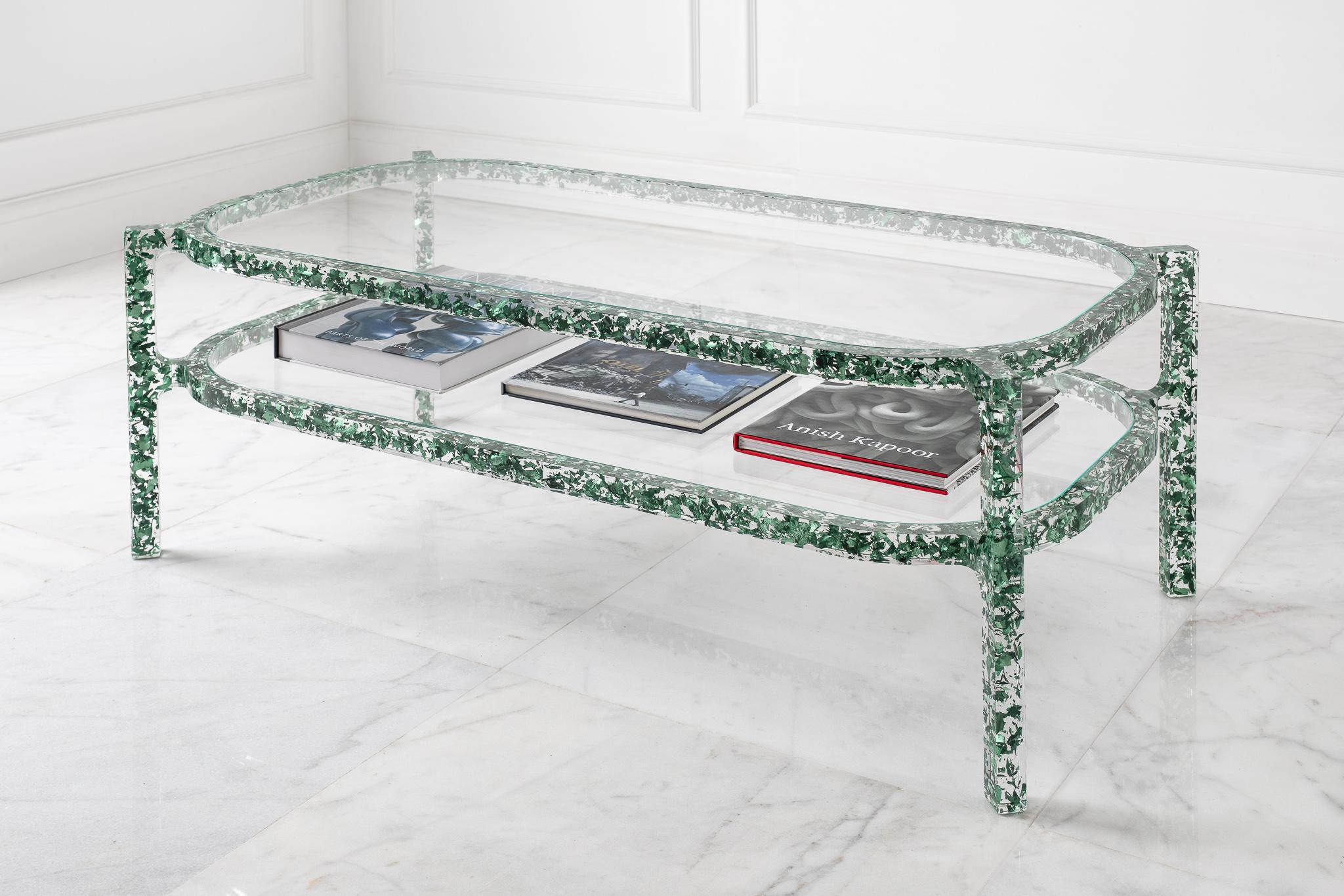 The MIDAS coffee table is comprised of carefully shredded coloured silver-leaf, all left to randomly float in the table’s crystal clear acrylic frame. Light bounces and reflects off the leaf providing a confetti-like pattern and a unique fragmented