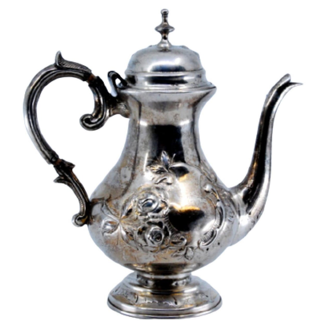 Coffee pot in embossed silver w/ floral motifs
engraved base
knob on the lid