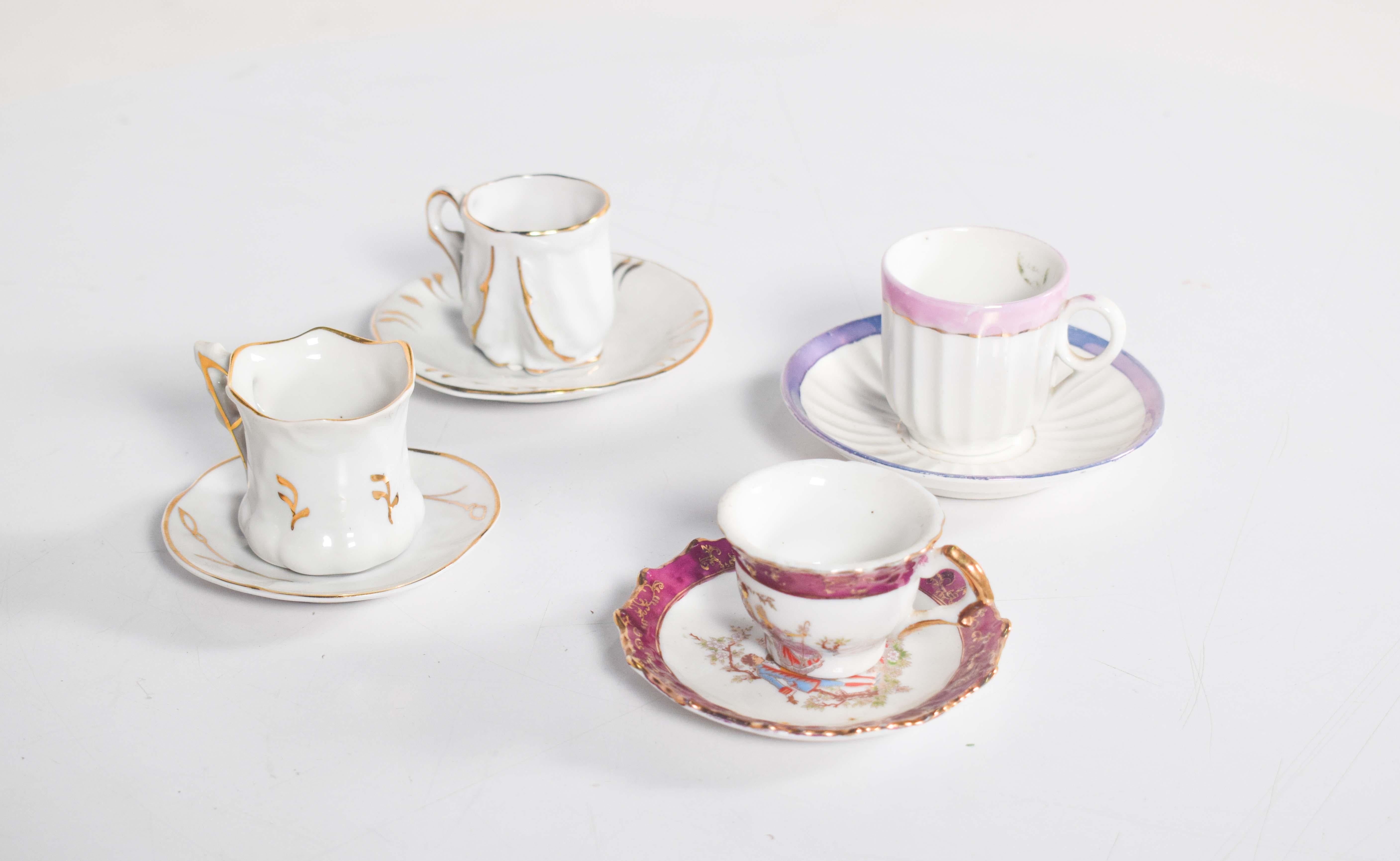 Mid-Century Modern Coffee Set of Four Different Cups and Saucers For Sale