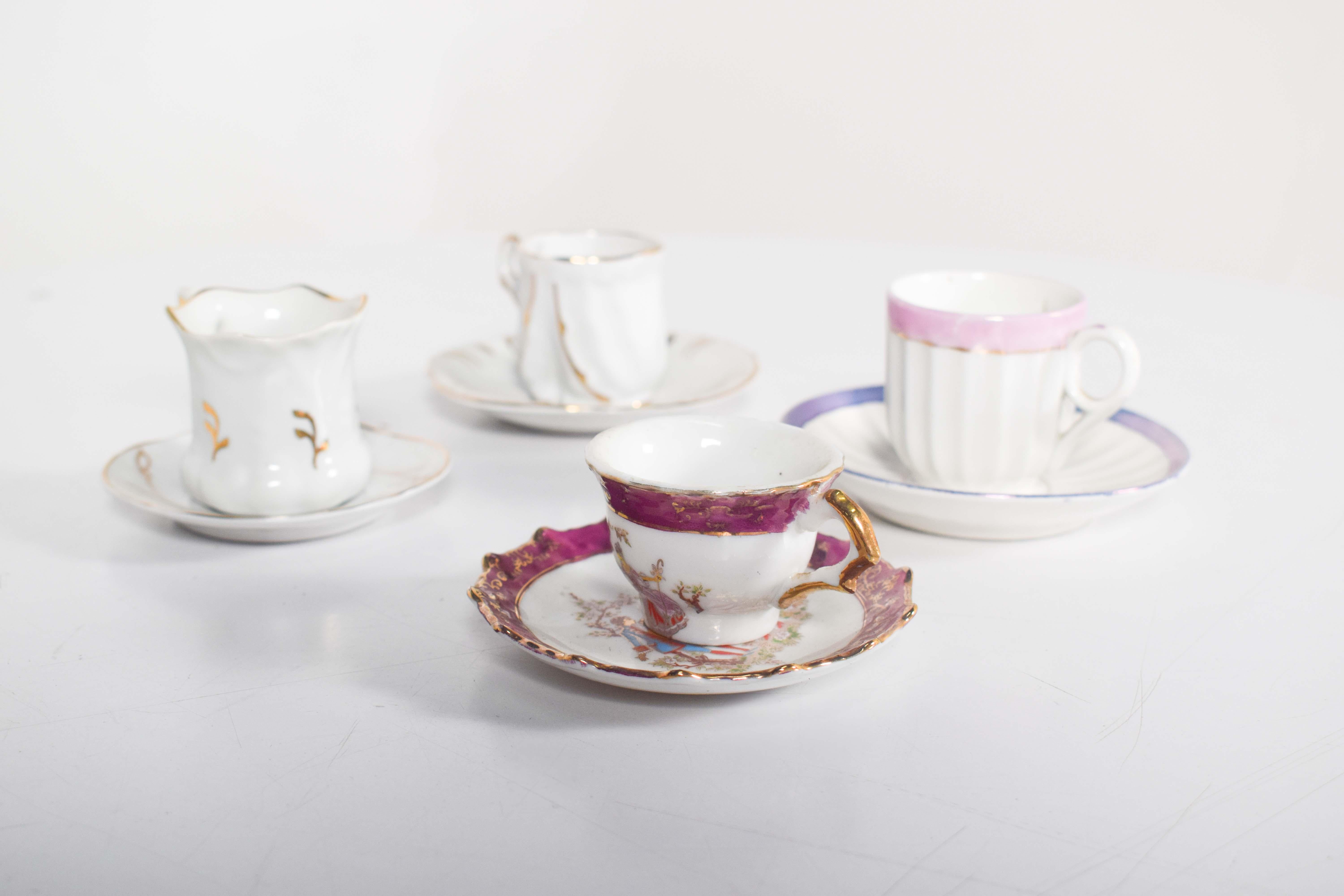 Portuguese Coffee Set of Four Different Cups and Saucers For Sale