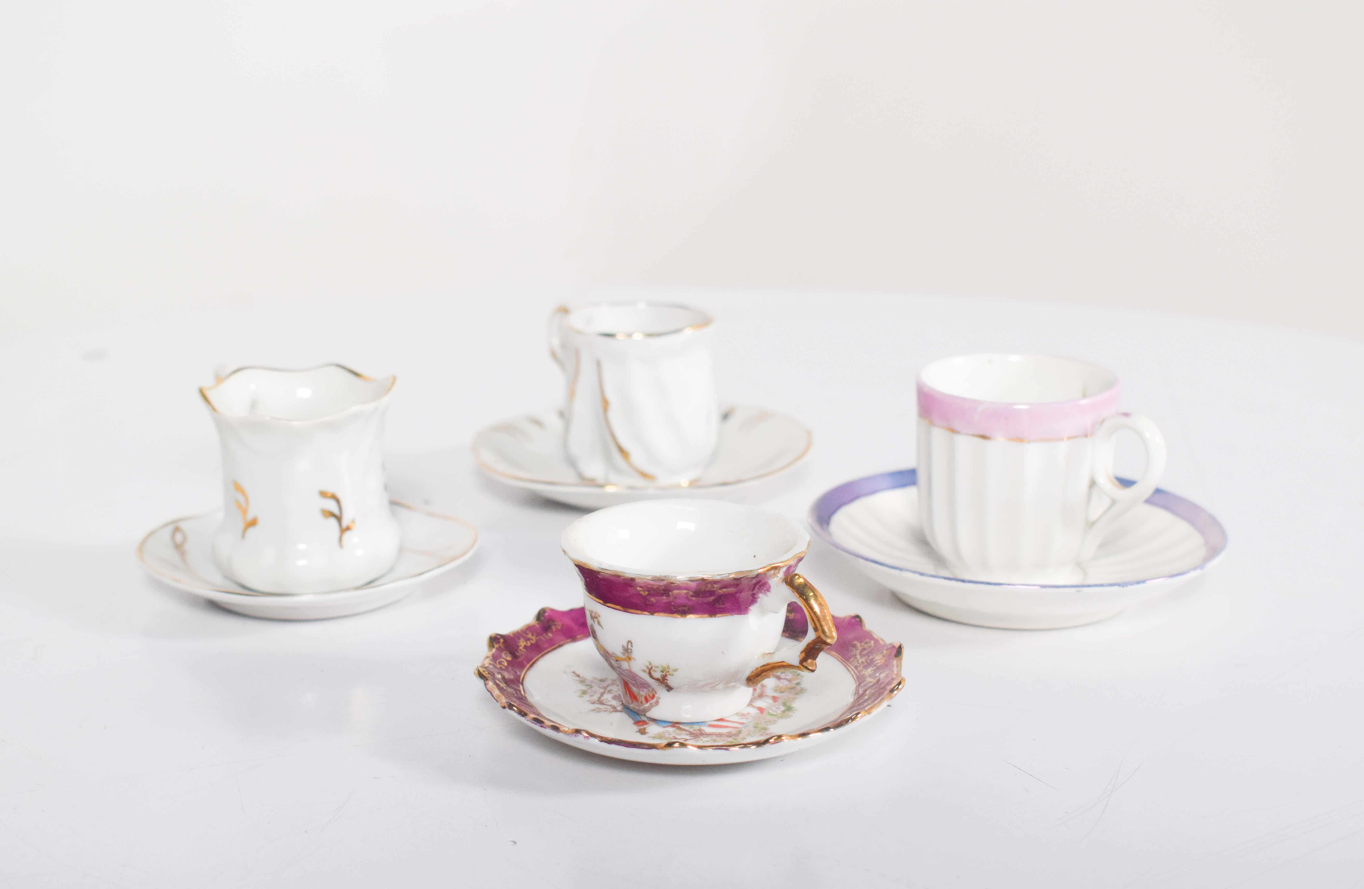 20th Century Coffee Set of Four Different Cups and Saucers For Sale