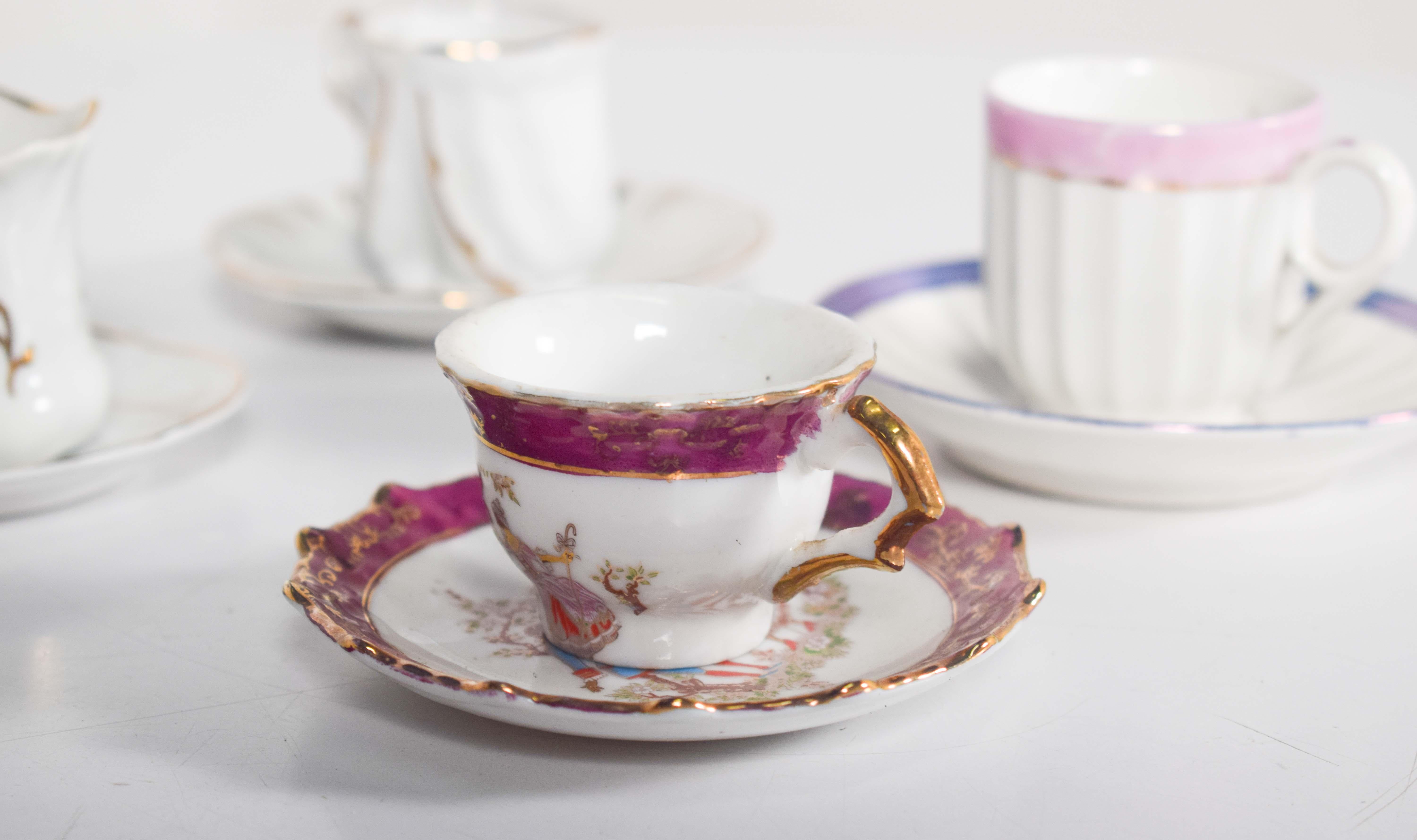 Coffee Set of Four Different Cups and Saucers For Sale 1
