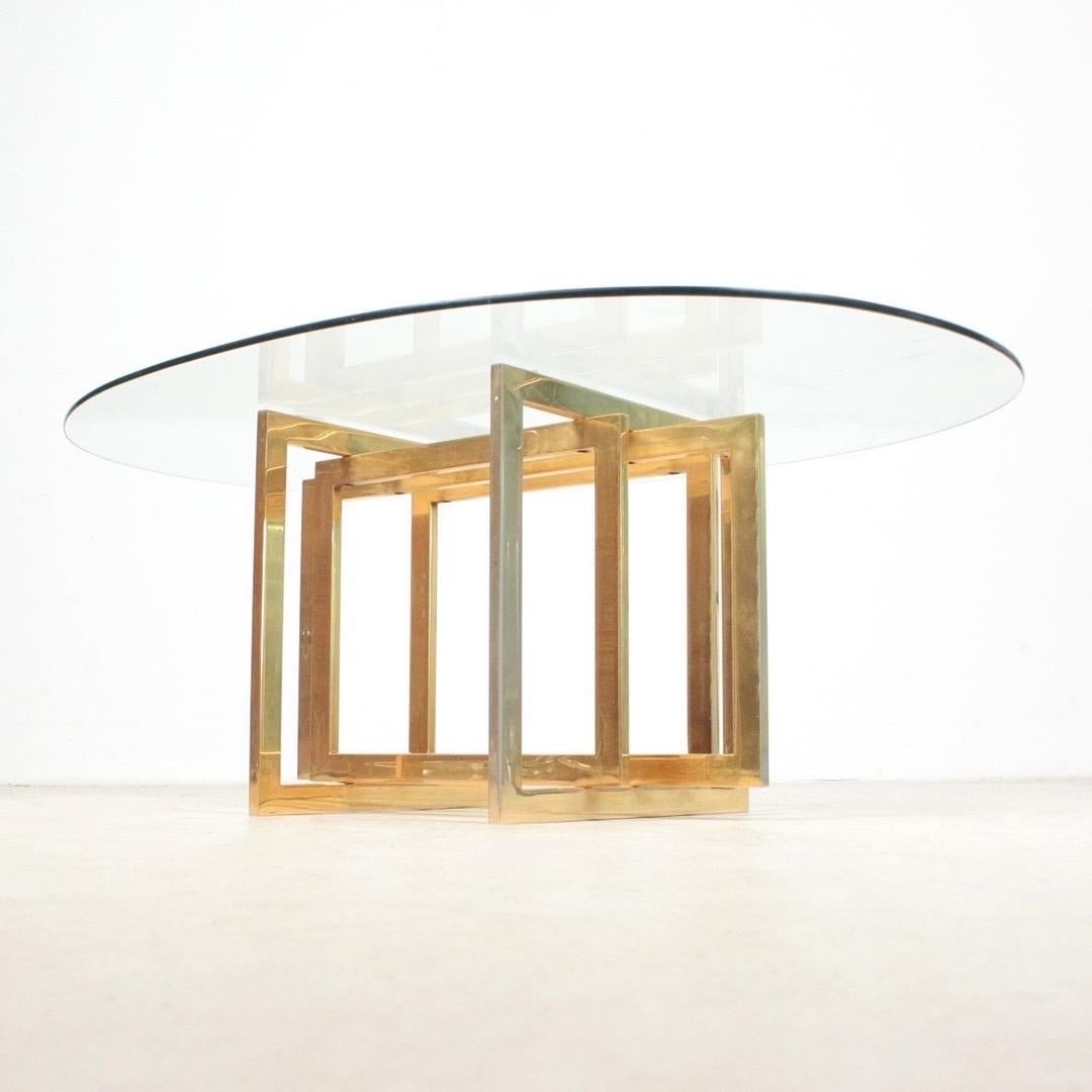 Pierre Cardin, coffee table / cocktail table /side table from the  1970s. The base is  a sculptural formed grid shaped brass frame, carrying  thick glass plate.

The table is amazingly beautiful, and really showcases Pierre Cardins  design