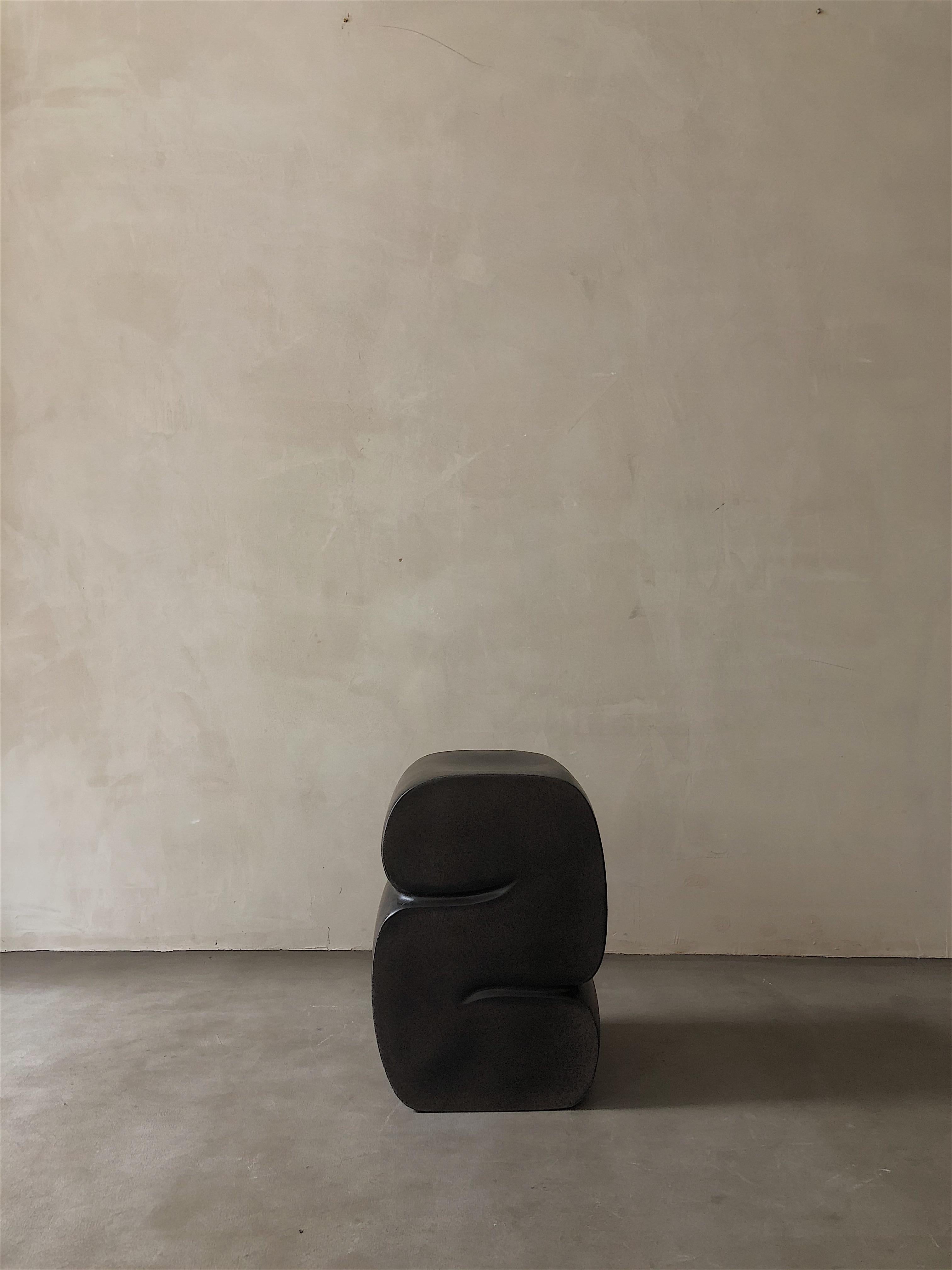 Coffee stool by Karstudio.
Materials: FRP.
Dimensions: 32 x 32 x 45 cm.

It shapes in a curl-up position, casual meanwhile restrained. The side designed as a cross-section of the furniture to present the curve and texture.

Kar- is the root of
