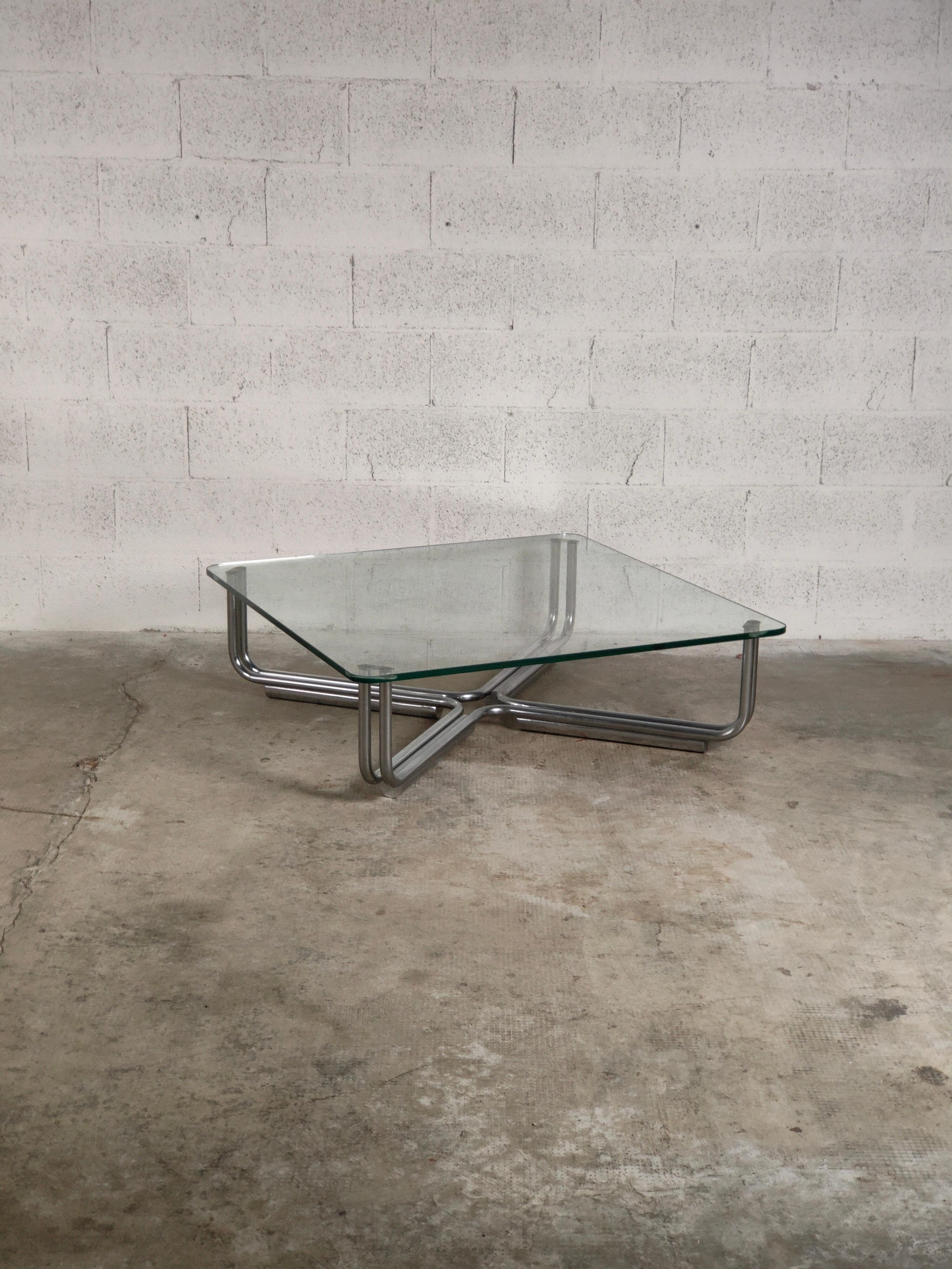Chromed steel and glass coffee table 784 model by Gianfranco Frattini for Cassina 70s.

Born in Padua in 1926, Gianfranco Frattini graduated in Architecture at the Milan Polytechnic in 1953, where he lived and worked until his death. His