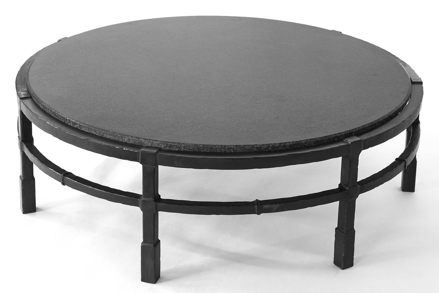 TABLE NO. 18
J.M. Szymanski
d. 2023

The forces of our steel smiths combined with the modern machine result in this carved iron coffee table with absolute black granite.
 
Custom sizes and stones available. Made in the Bronx, New York, USA.

Our