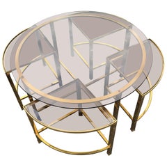 Coffee table and  4 extra shelves in brass and glass smoked Maison Baguès style