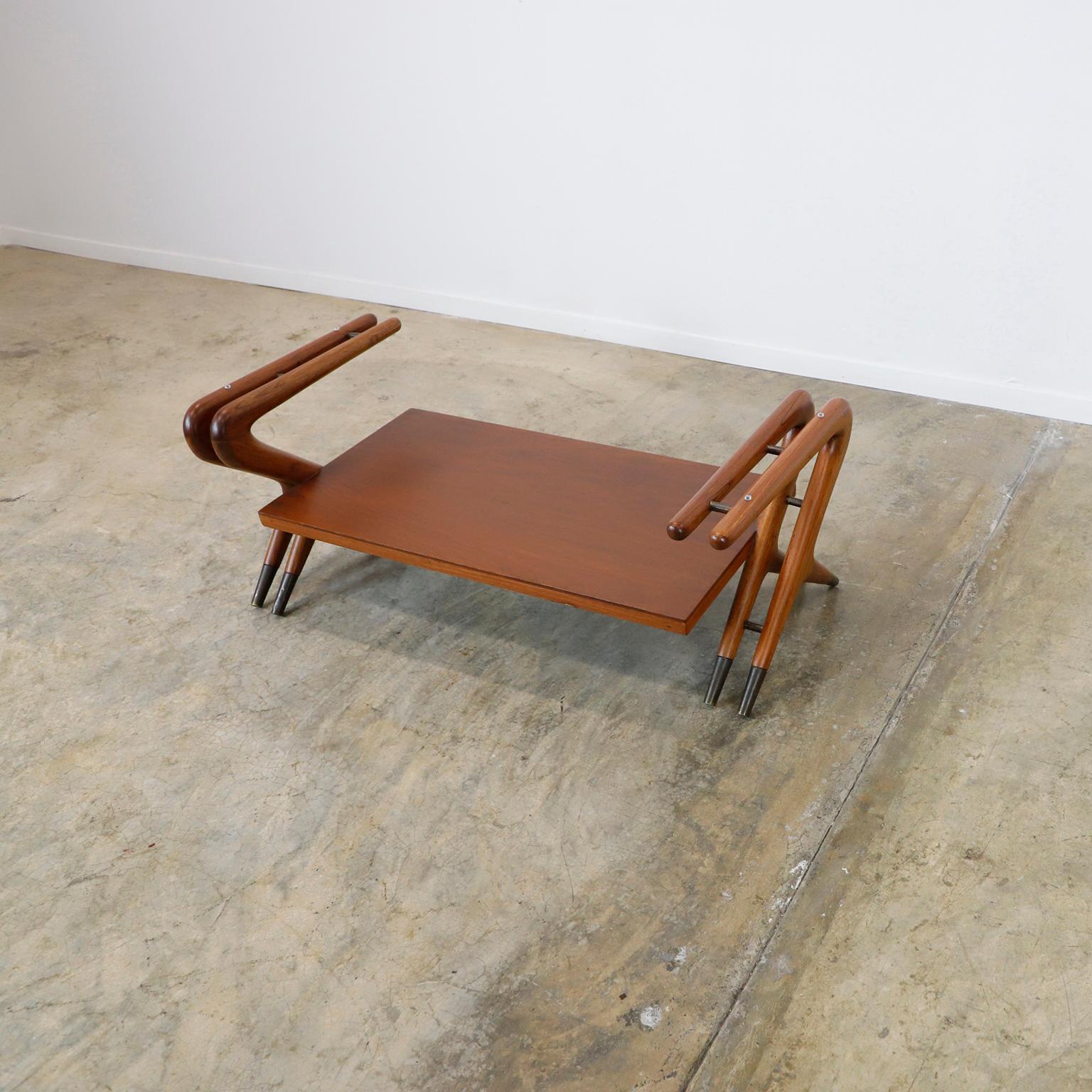 We offer this coffee table with the amazing and characteristic design of Eugenio Escudero, made in México in mahogany wood, circa 1950. We do not include glass for best shipping but you can visualize the table with its glass in image 3. 