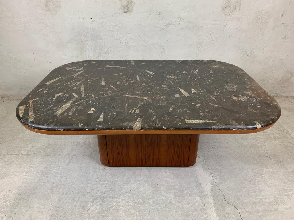 Coffee table attributed to Heinz Lilienthal, wood with a marble top with fossils from the Devonian period, a natural seam running diagonally across te thop. Germany.

