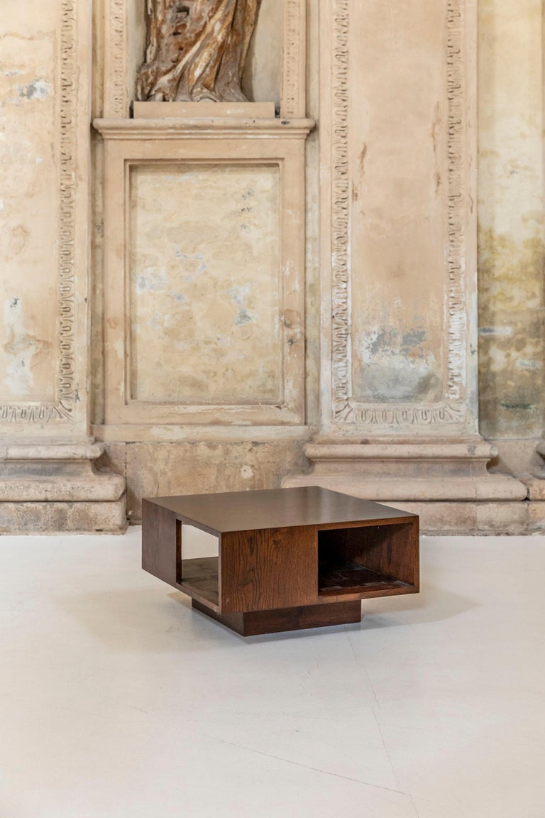 Awesome wood squared coffee table attributed to Officine Rivadossi.


 