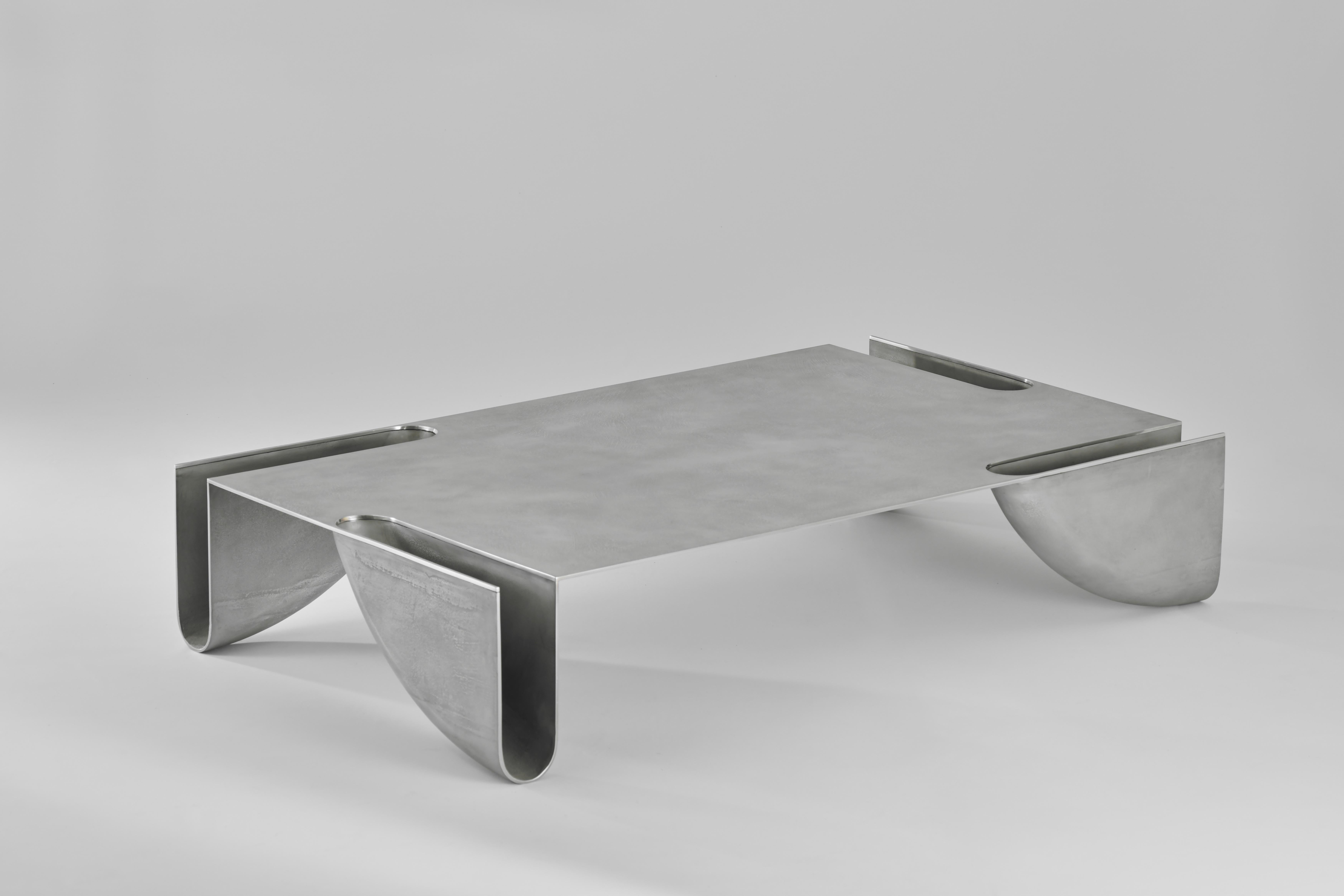 The “bb” table is part of Corpus Studio’s sculptural bb collection. The collection seeks to explore the limits between minimal and maximal, brutalism and elegance, sensual and humorous.

The sculptural design comes from the convergence of tectonic