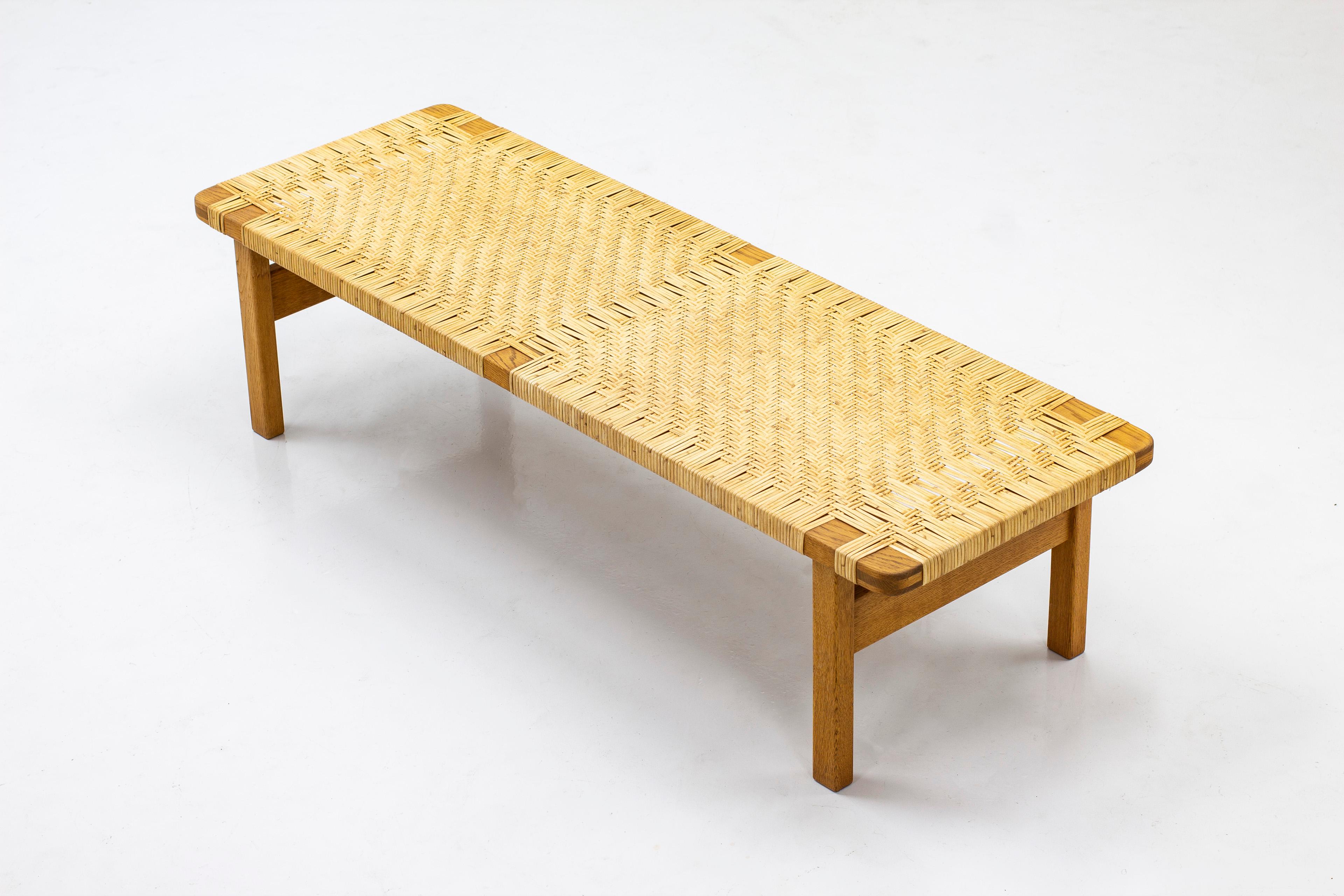 Coffee table/bench model 5272 designed by Børge Mogensen. Produced in Denmark by Fredericia furniture in the late 1950s-60s. Made from solid oak with cane webbing. Very good vintage condition with patina from age and use.

  