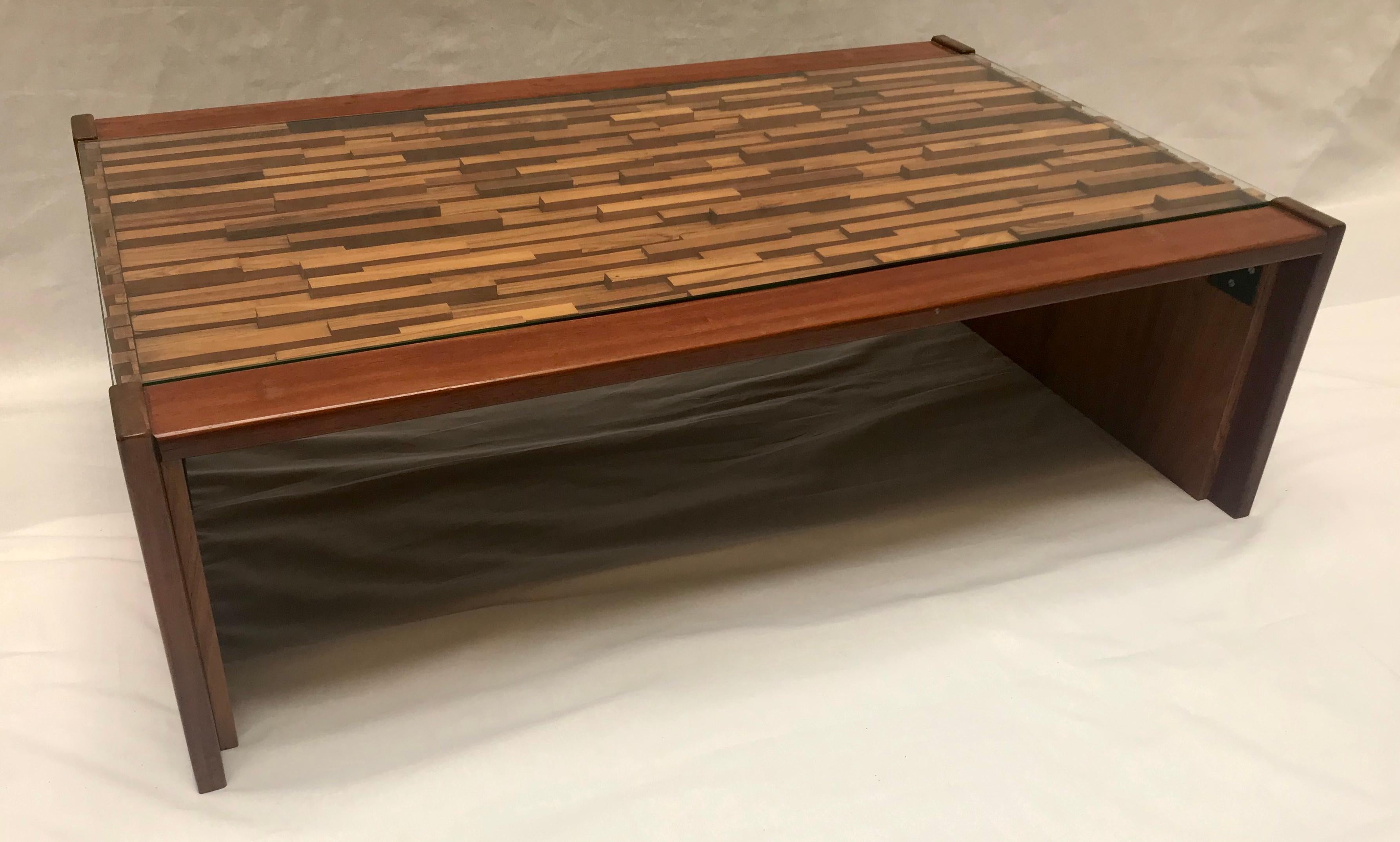 Percival Lafer, coffee table with glass top, Brazilian hardwood and mahogany,

circa 1970.