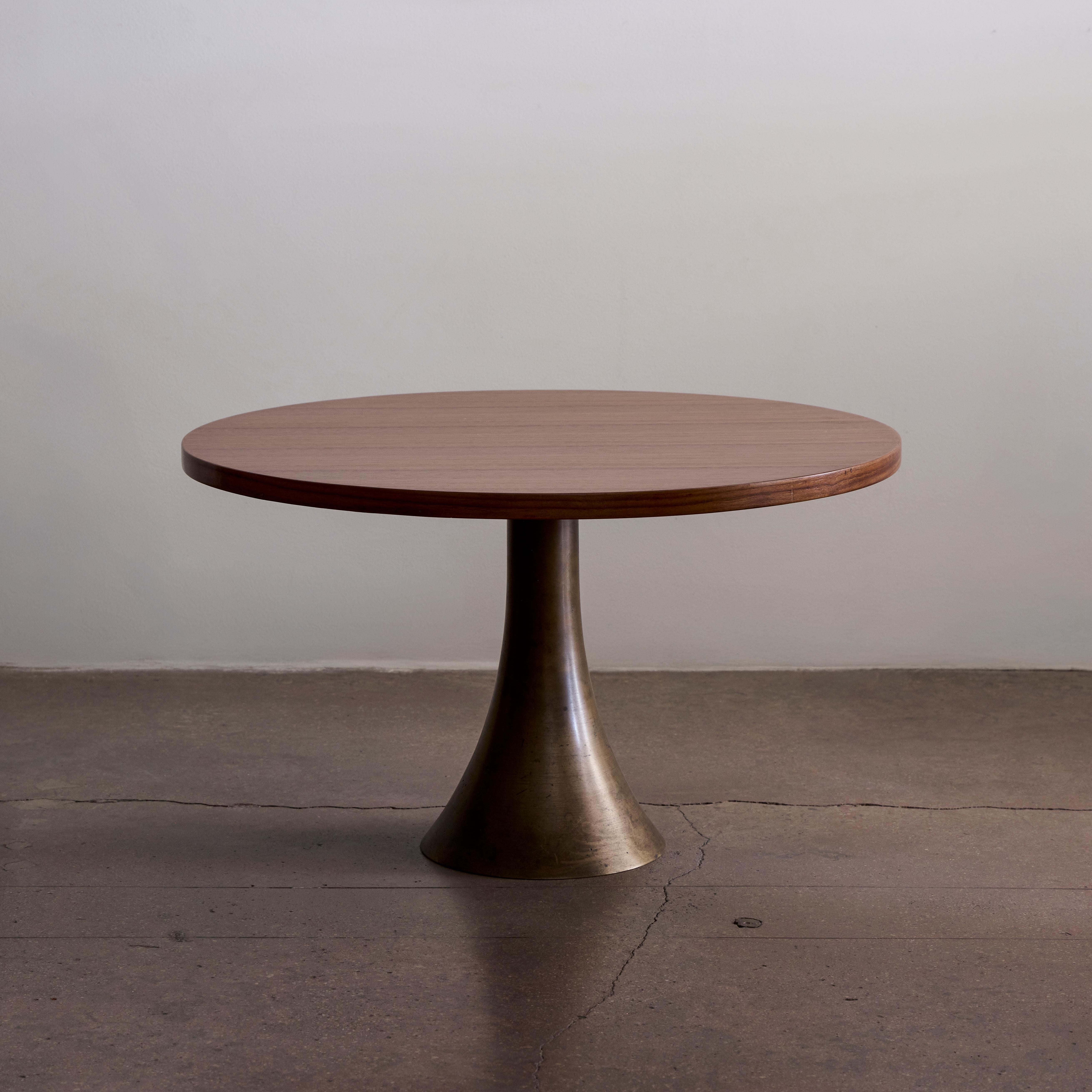 Rare side table with bronze base and wood round top by Angelo Mangiarotti. Produced by Fonderie Battaglia for Bernini. Made in Italy circa 1960s.

Bibliography
I. De Guttry, M.P. Maino, Il mobile Italiano degli anni 40 e 50,Laterza, 1992 pp