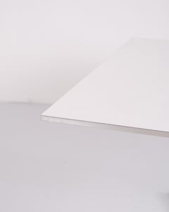 Coffee table by Arne Jacobsen & Piet Hein with white laminate top and steel edge