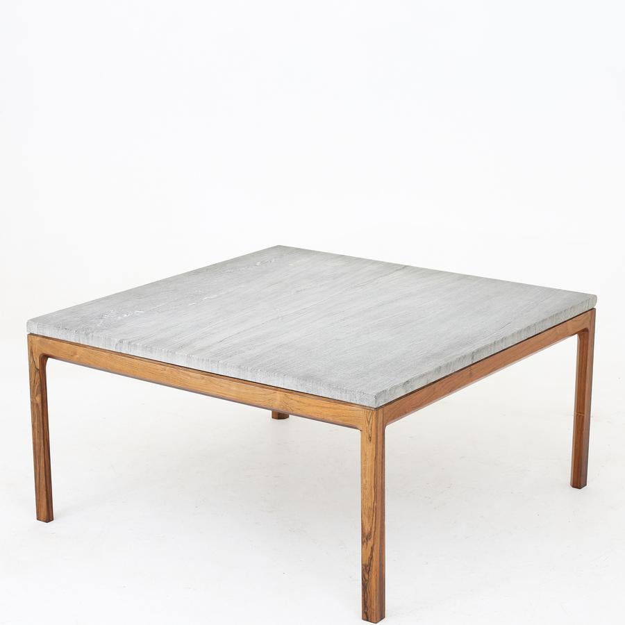 Coffee table in rosewood with top of Cippolini marble. Maker Wørts Møbelsnedkeri.