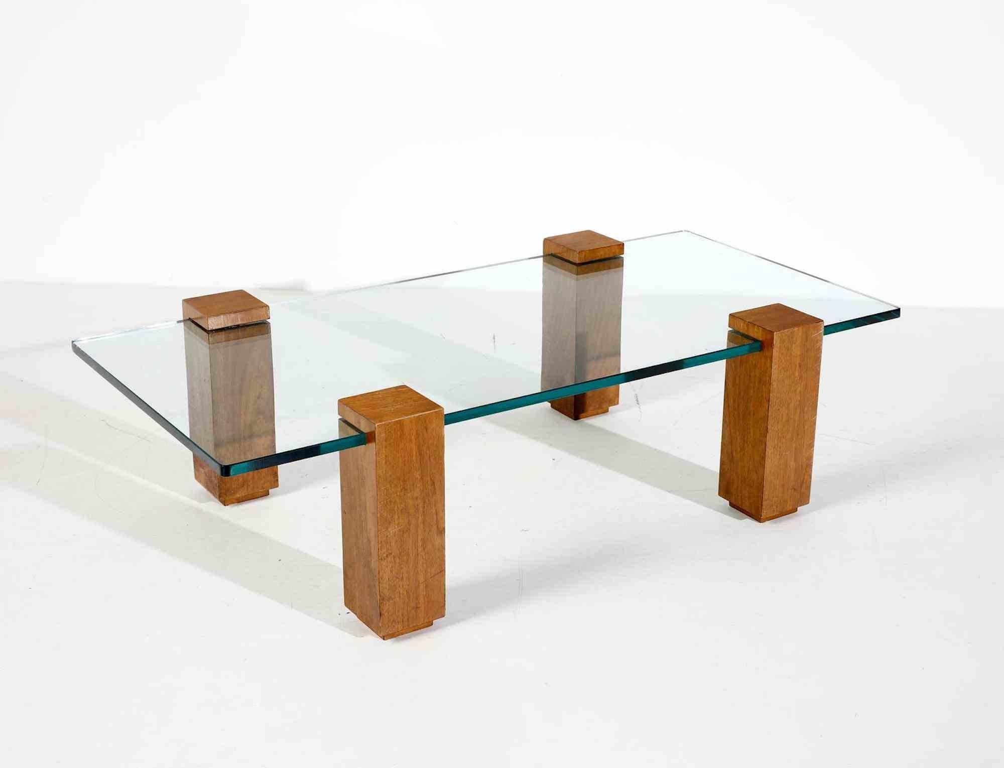 Coffee table is a table designed by Edoardo Detti, Italy 1960s.

Dimensions: Cm 140,00 x 39,00 x 73,00.

Glass and wood.

Good conditions!