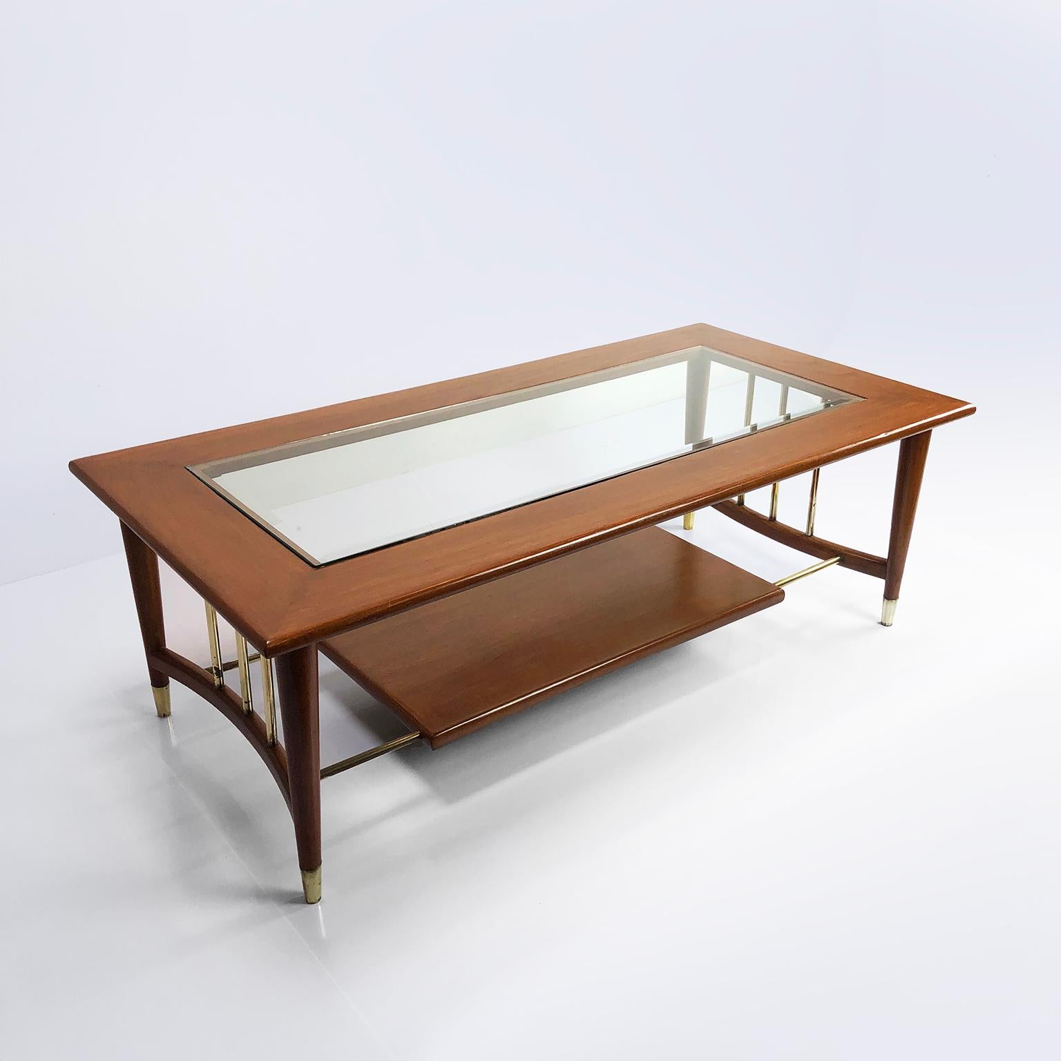 This amazing coffee table are made of mexican mahogany and brass,
circa 1960s.

About Frank Kyle

Frank Kyle was an American sculptor and furniture designer from Minneapolis, though he mainly lived in California. Kyle moved to Mexico City in