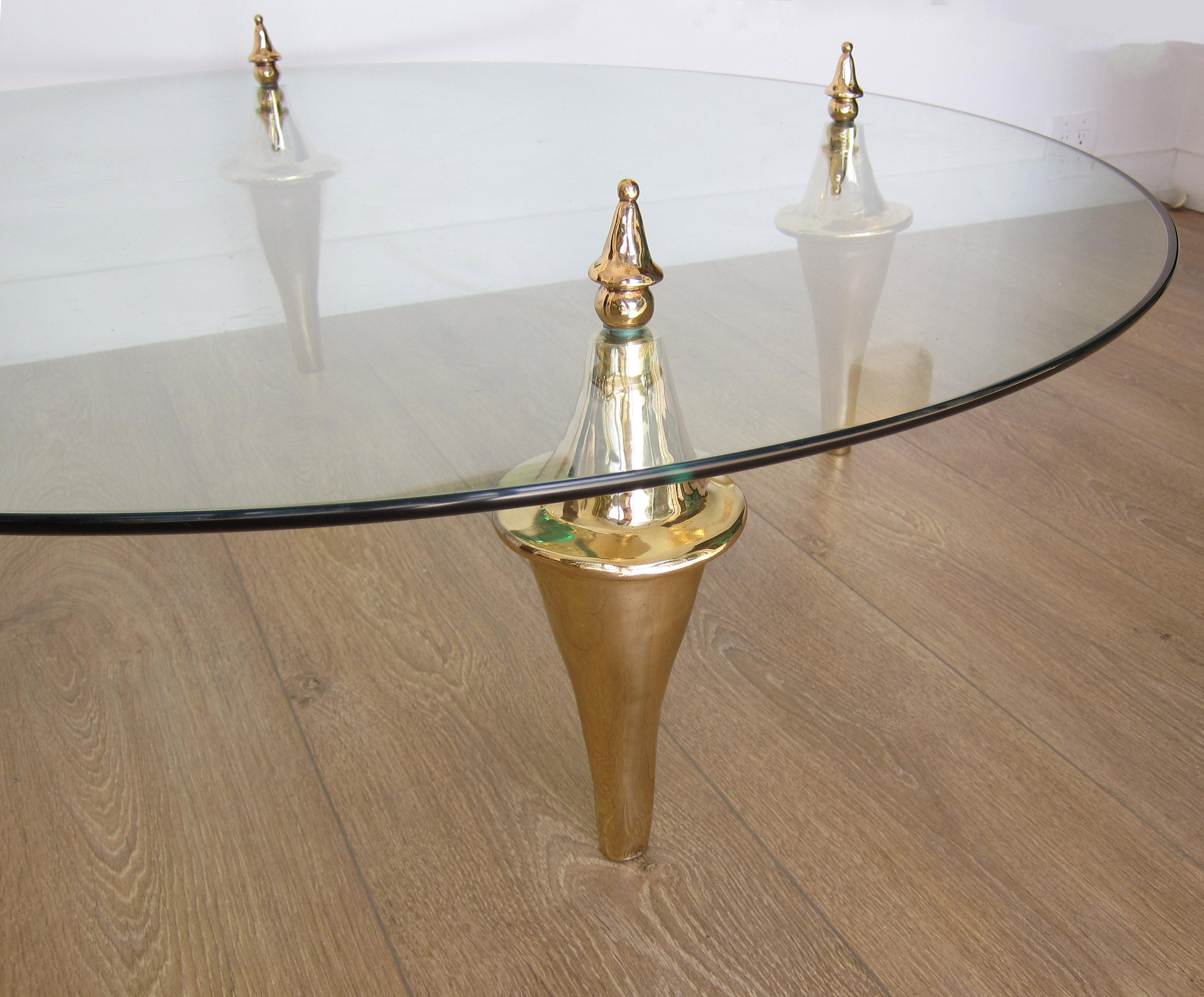 Coffee table by Garouste and Bonetti, model Zeus
Four polished bronze feet,
Thick round glass top
Impressed signature.
Located in our store in Miami ready for shipping.