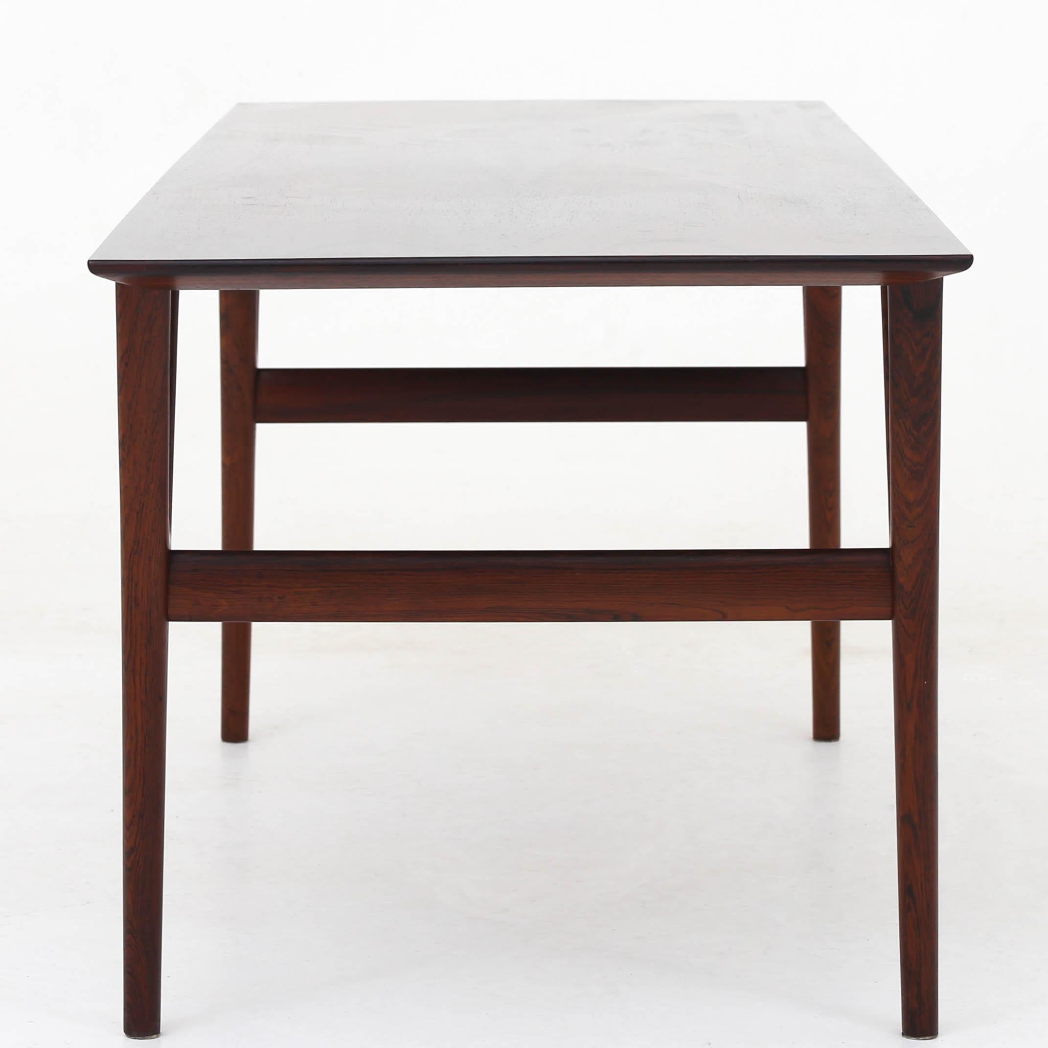 Coffee table in rosewood with original brand from master cabinetmaker. Model U55. Maker Peder Pedersen