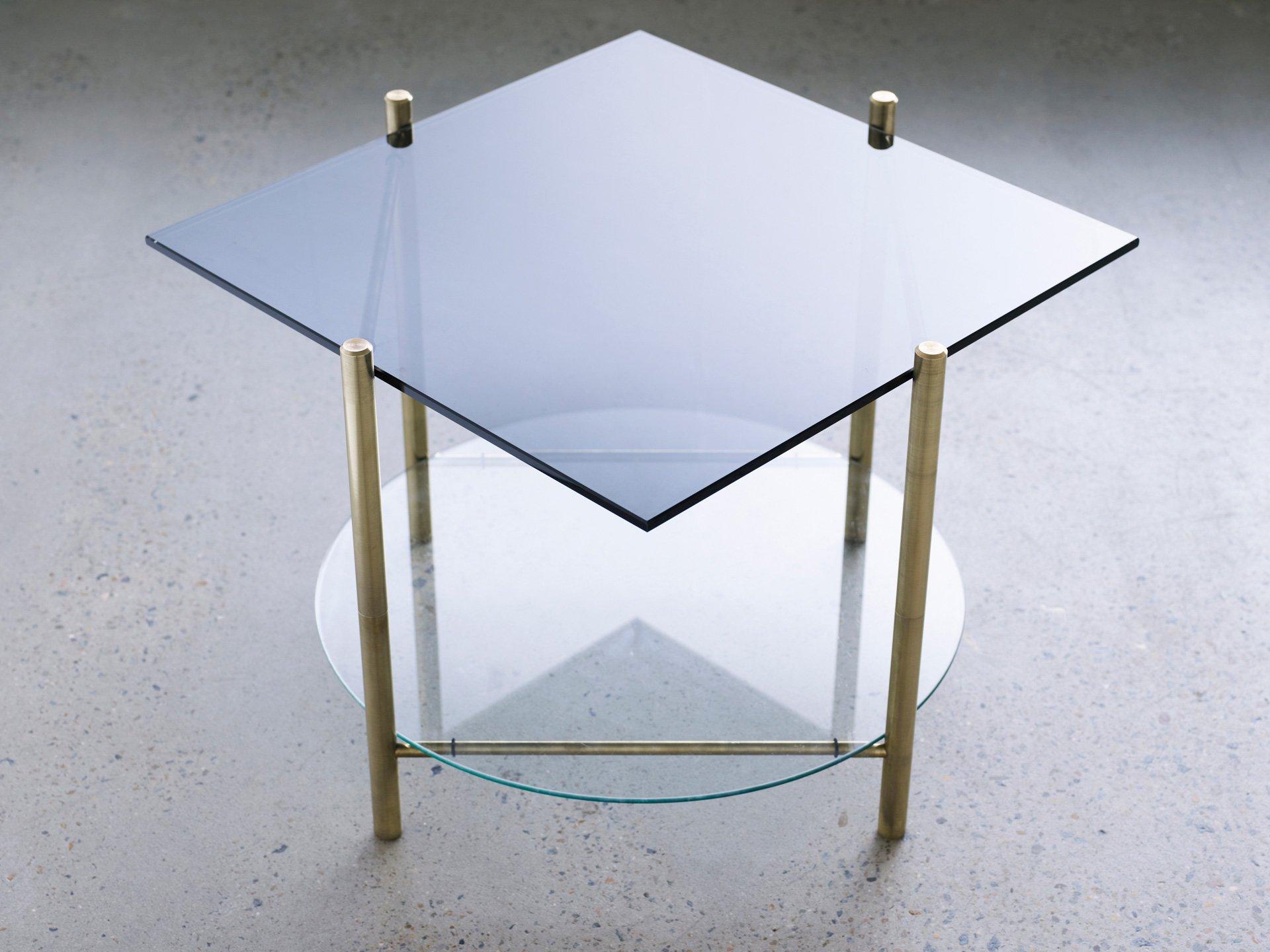 Coffee table by Henry Wilson
Square table/Round table

Solid brass frame with two tiered surfaces. All the tables are made to order in client specified materials. Some possibilities are; stone varieties, timbers, clear glass and coloured glass,