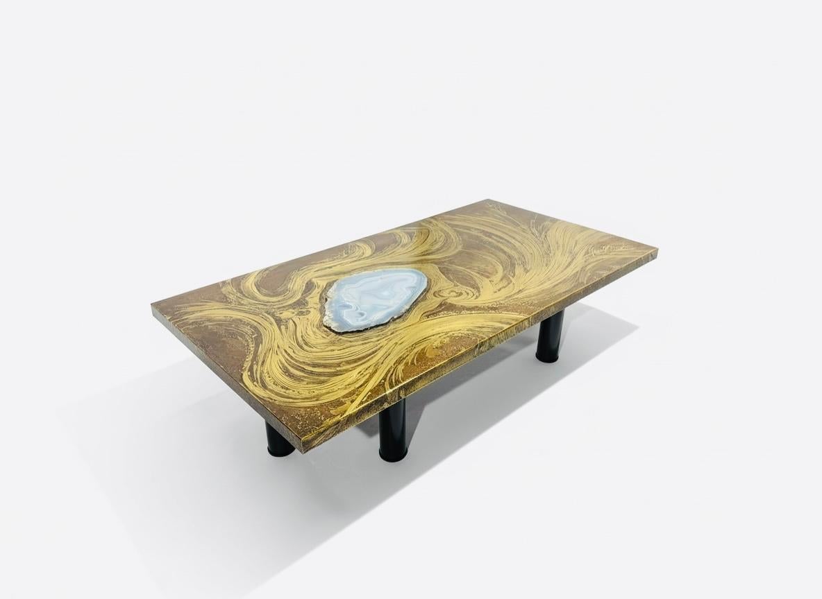 Belgian Modern design rectangular and sculptural Brass etched  coffee table with inset Agate  gemstone on a etched decorative movement brass. on 6 black metal base. signed and by MARC D'HAENENS.

