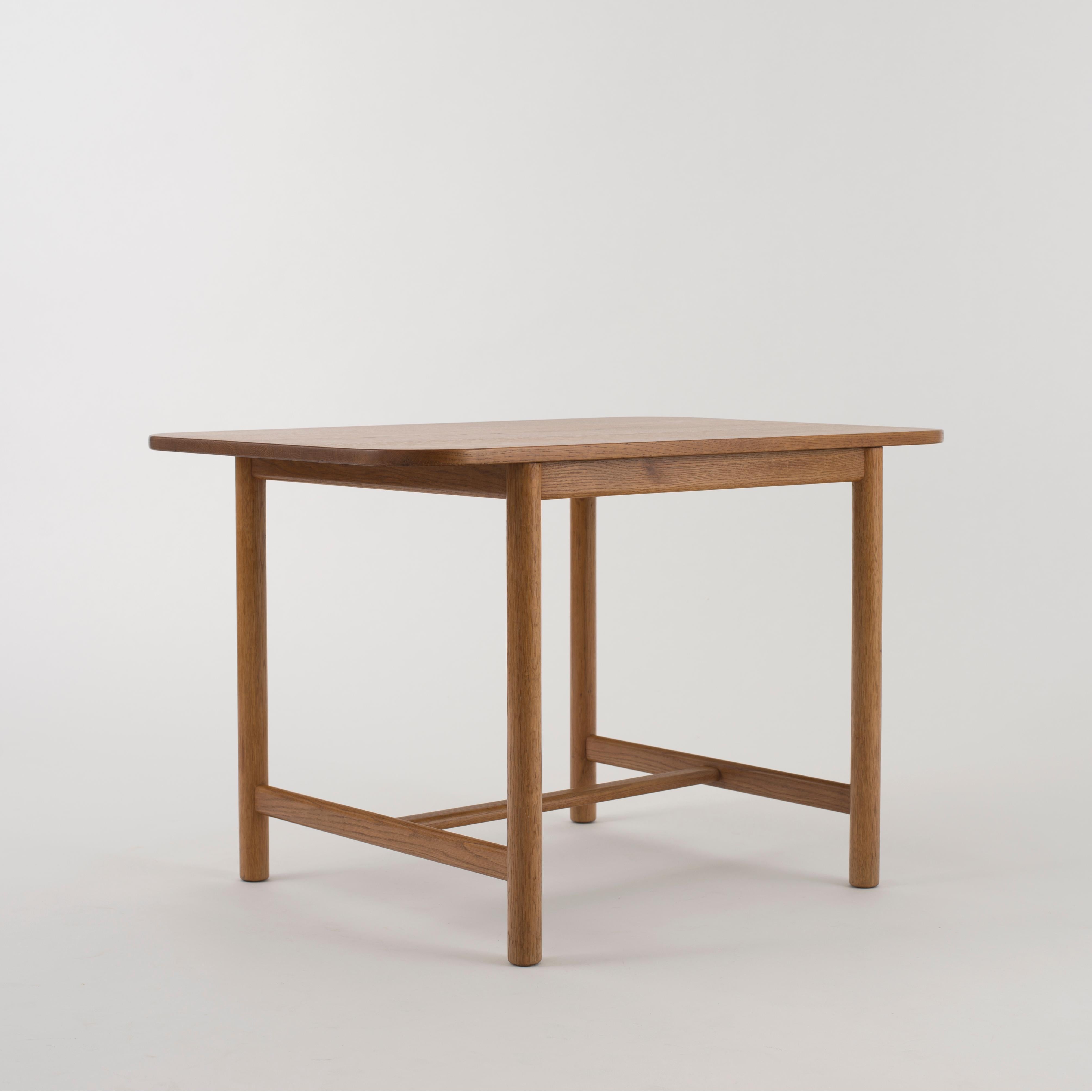 Mogens Koch, coffee table in oak, 1936.

Executed by Holger Larsen, Copenhagen, Denmark, 1930s.
 