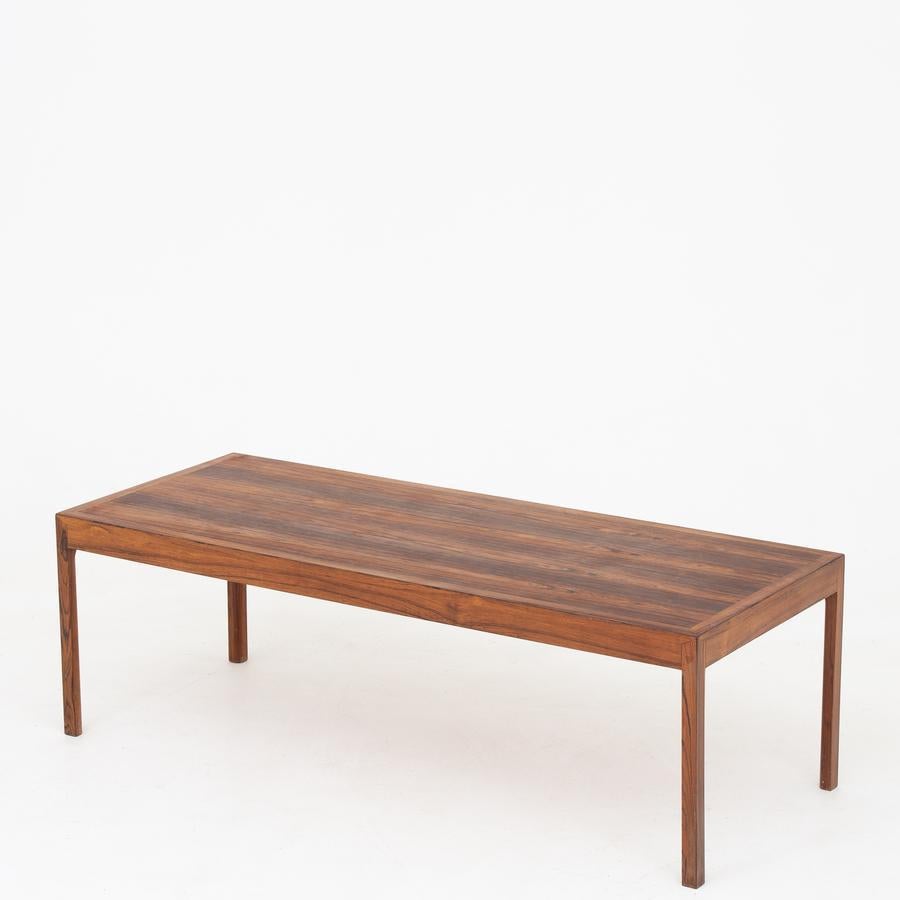 Rectangular coffee table in rosewood. Maker A. J. Iversen.